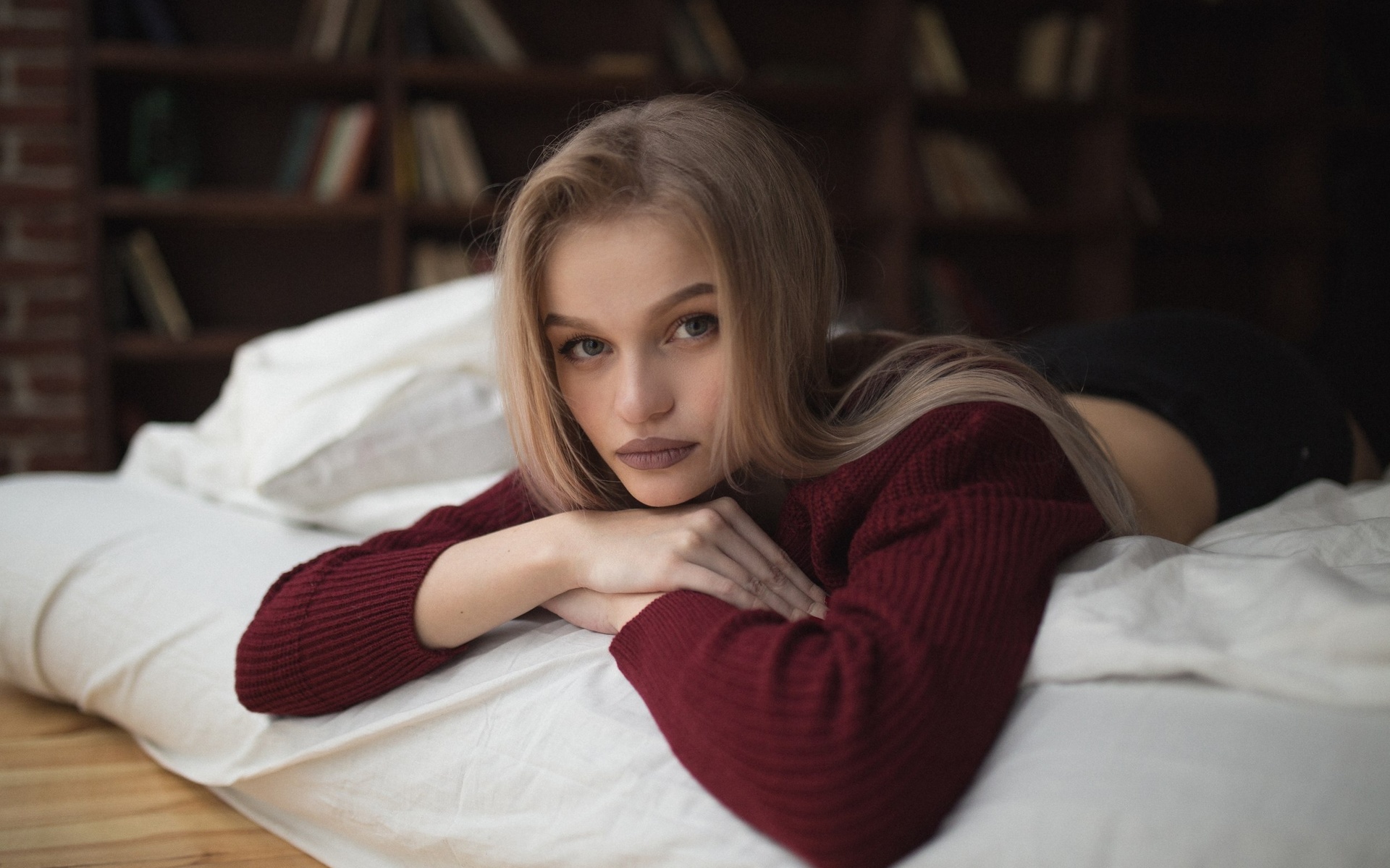 women, blonde, portrait, depth of field, lying on front, books, face