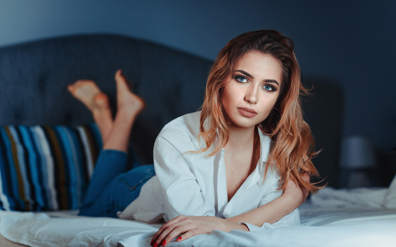 women, redhead, jeans, red nails, shirt, in bed, blue eyes, depth of field, lying on front