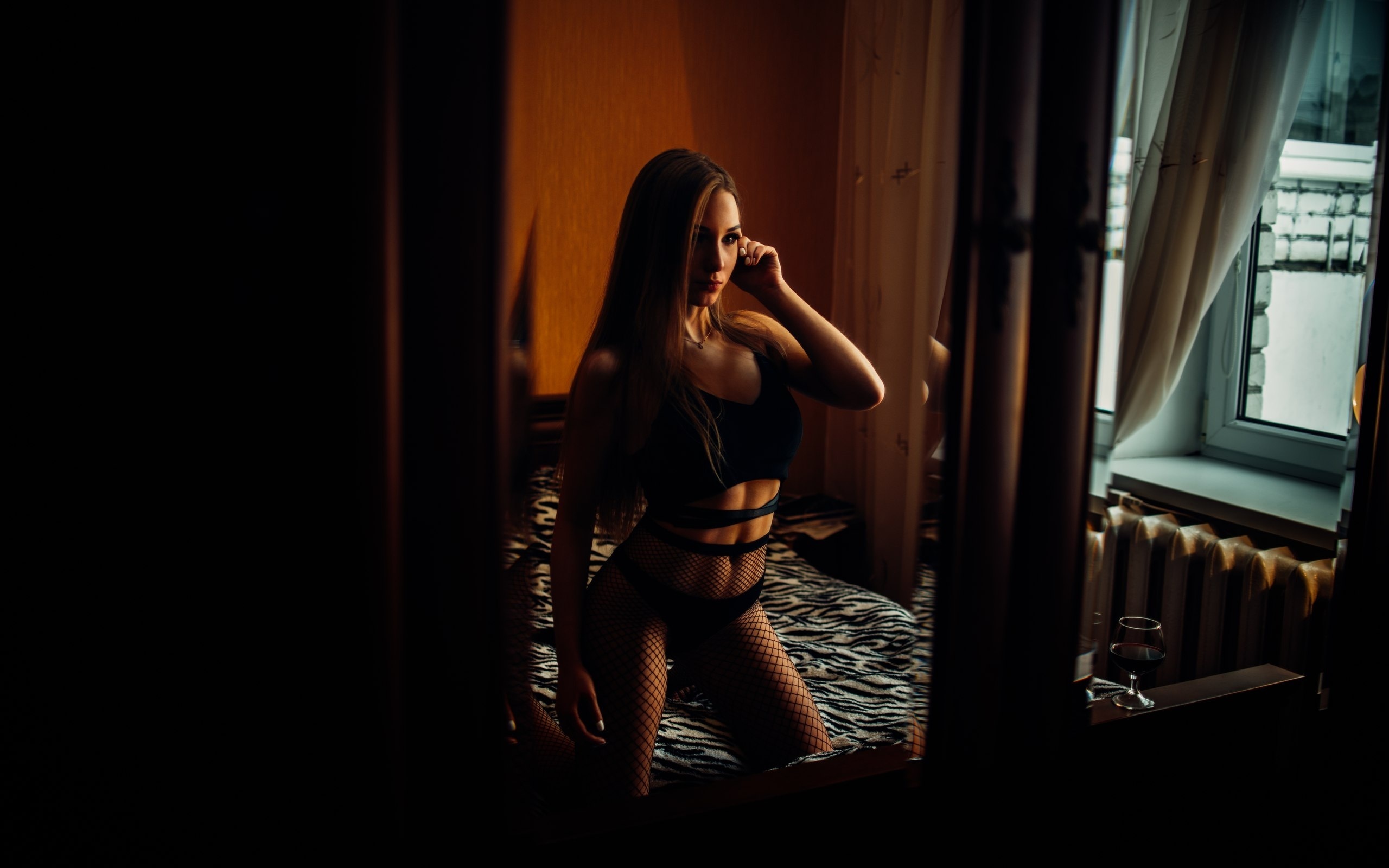 women, tanned, black lingerie, belly, fishnet lingerie, kneeling, in bed, fishnet stockings, white nails, looking away, window, drinking glass, necklace, long hair