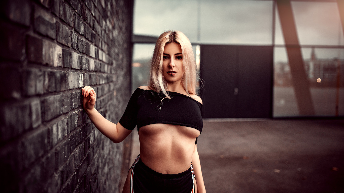 women, boobs, blonde, pierced lip, belly, wall, bricks, underboob, portrait, black clothing