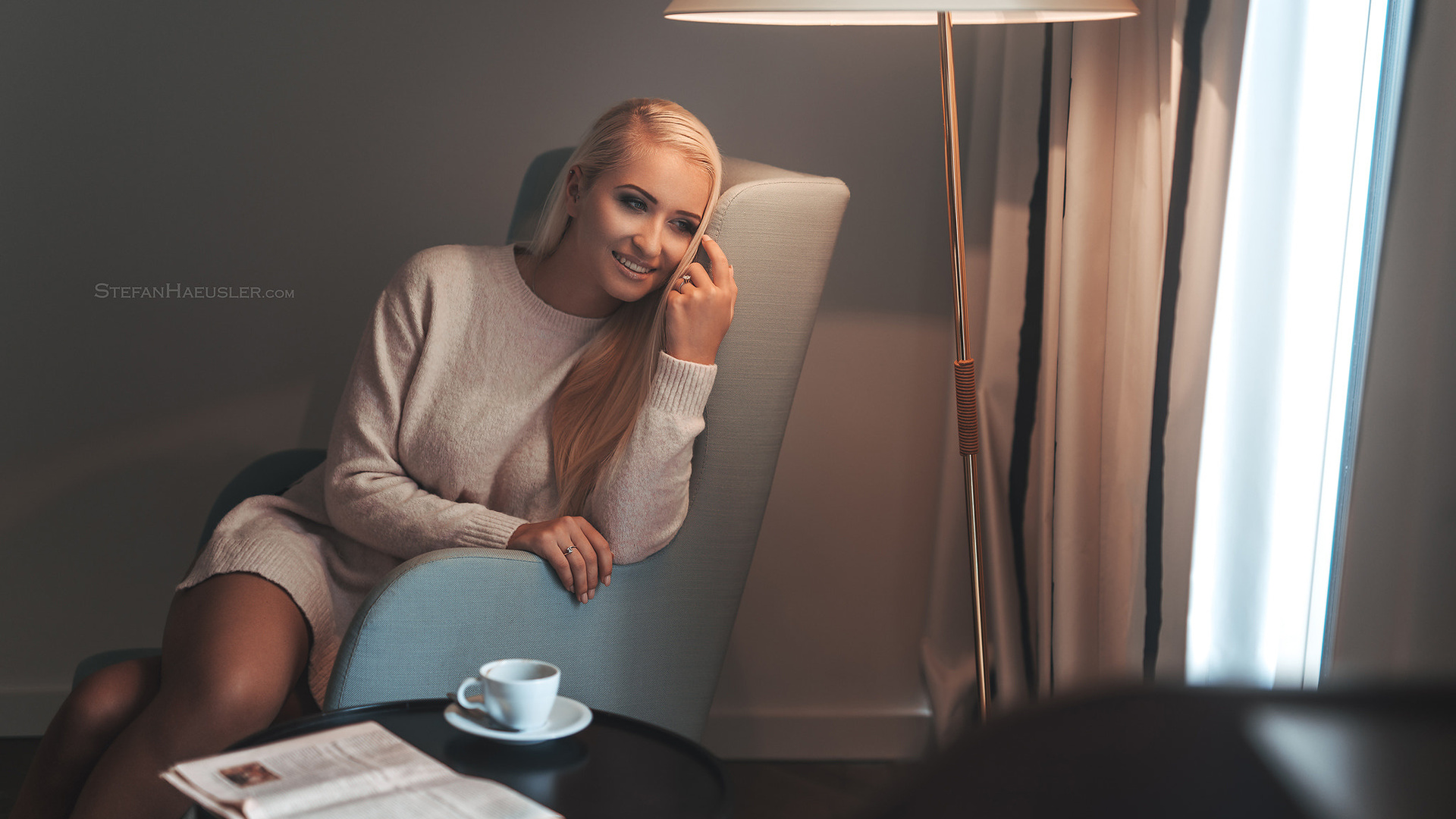 women, blonde, sitting, lamp, smiling, looking away, portrait