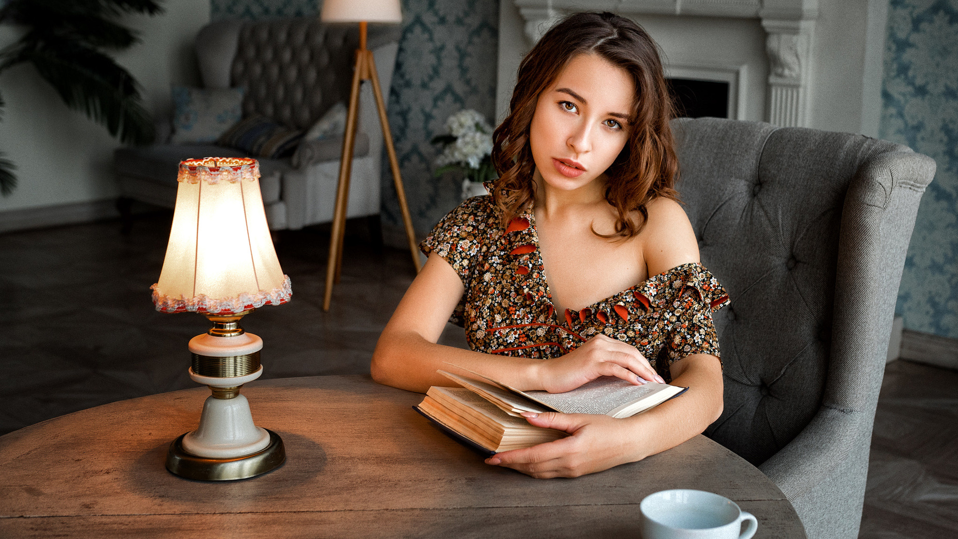 women, sitting, lamp, table, cup, portrait, books