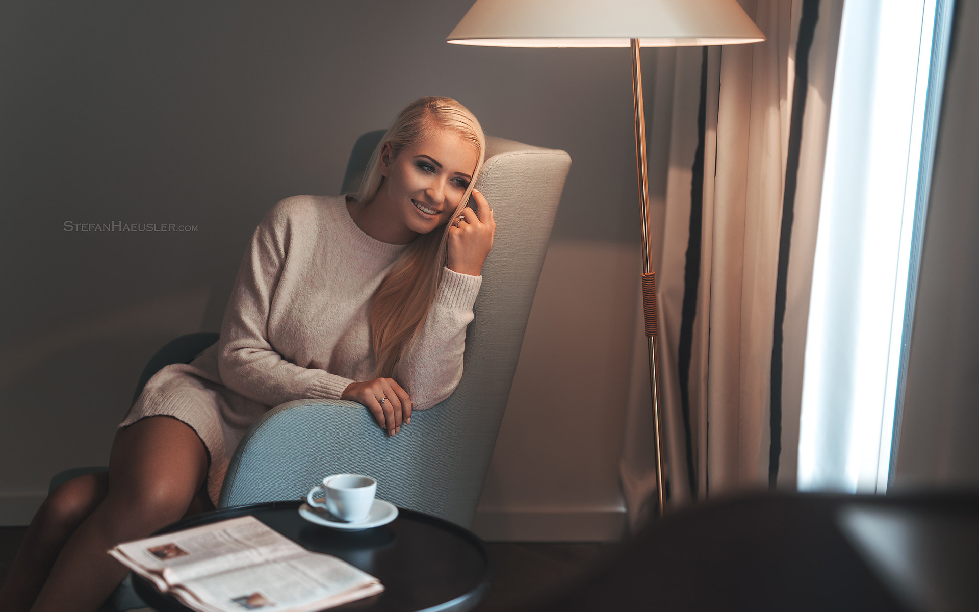 women, blonde, sitting, lamp, smiling, looking away, portrait