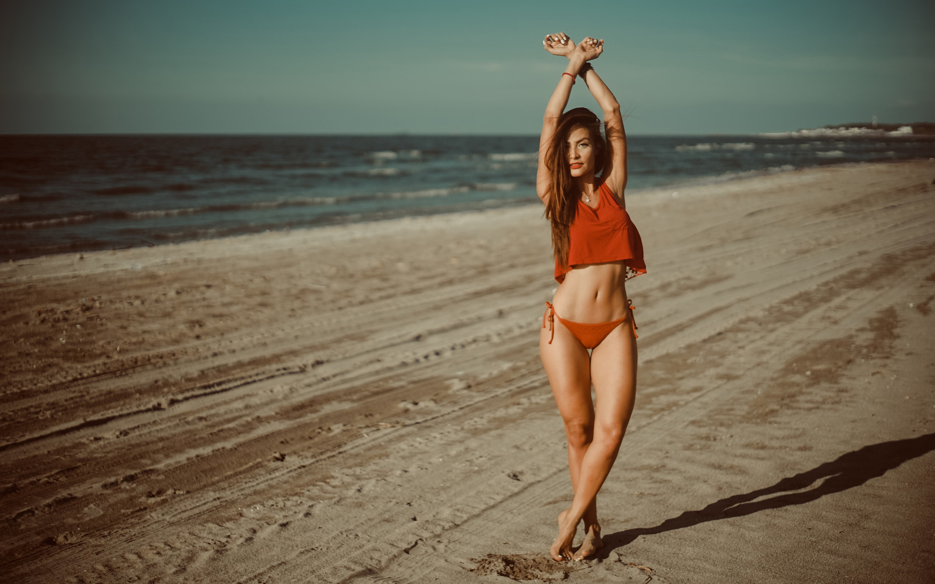 women, sea, beach, sand, women outdoors, belly, arms up, white nails, swimwear, the gap, necklace, red bikini, red lipstick