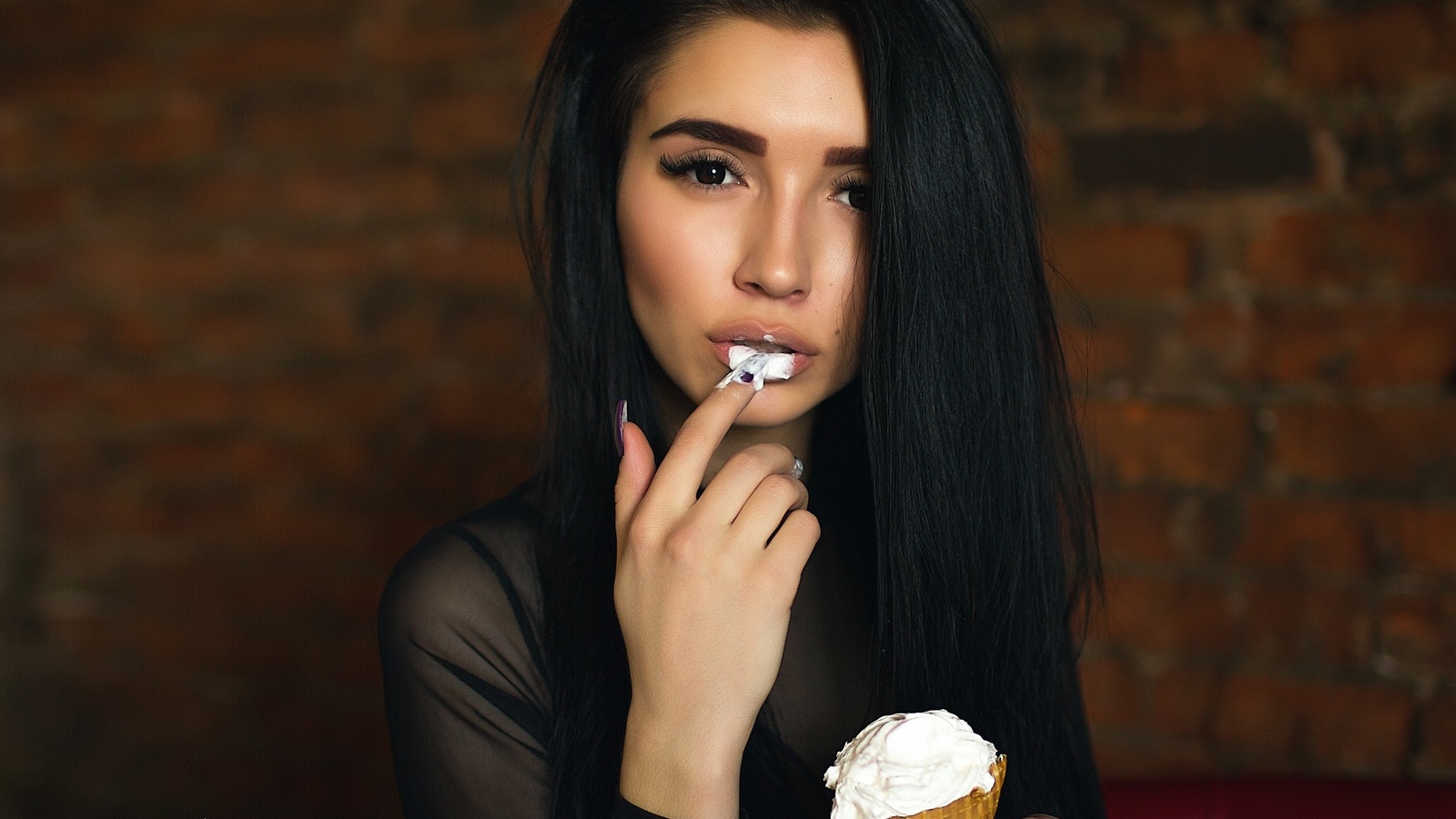 women, face, portrait, wall, bricks, finger on lips, ice cream, black hair