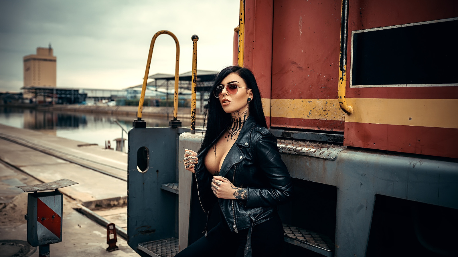 women, sunglasses, boobs, tattoo, leather jackets, train, pants, piercing, black clothing, black hair, women outdoors