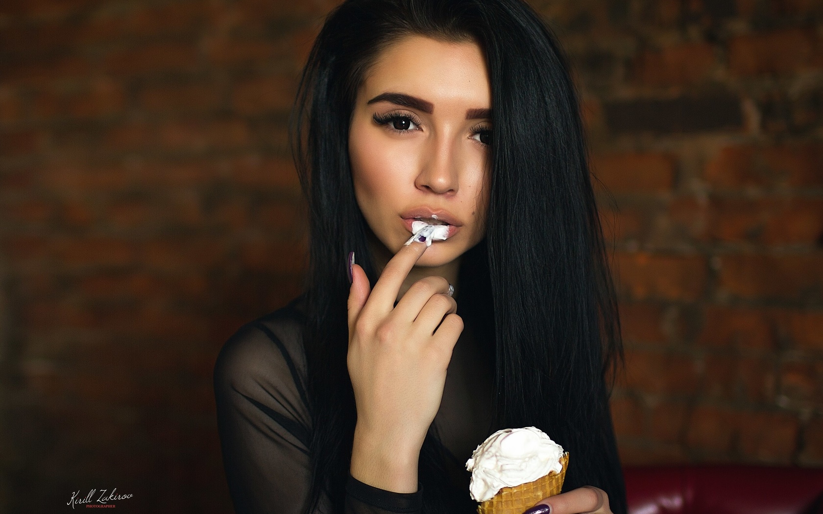 women, face, portrait, wall, bricks, finger on lips, ice cream, black hair