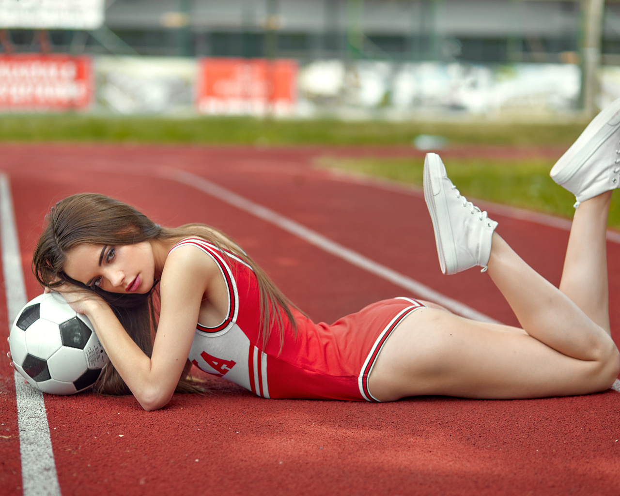 women, ass, marika pela, brunette, lying on front, sneakers, portrait, depth of field, ball, women outdoors, sportswear, pawel witkowski