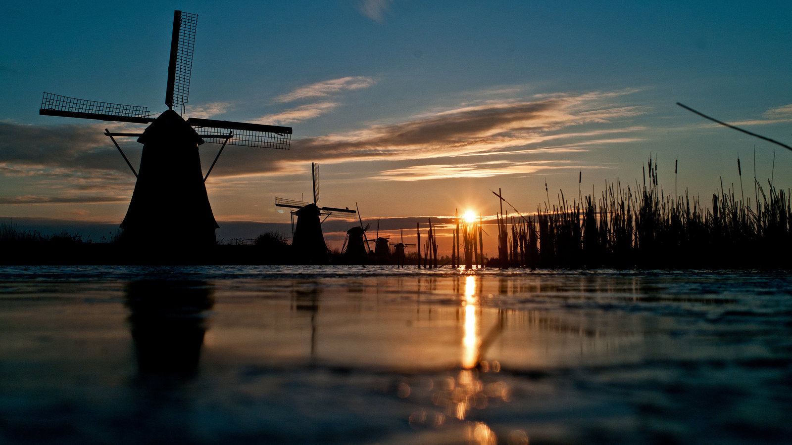 channel, windmill, the sun, the sky, grass, river, sunset,     ?, , , , , , , , , , 