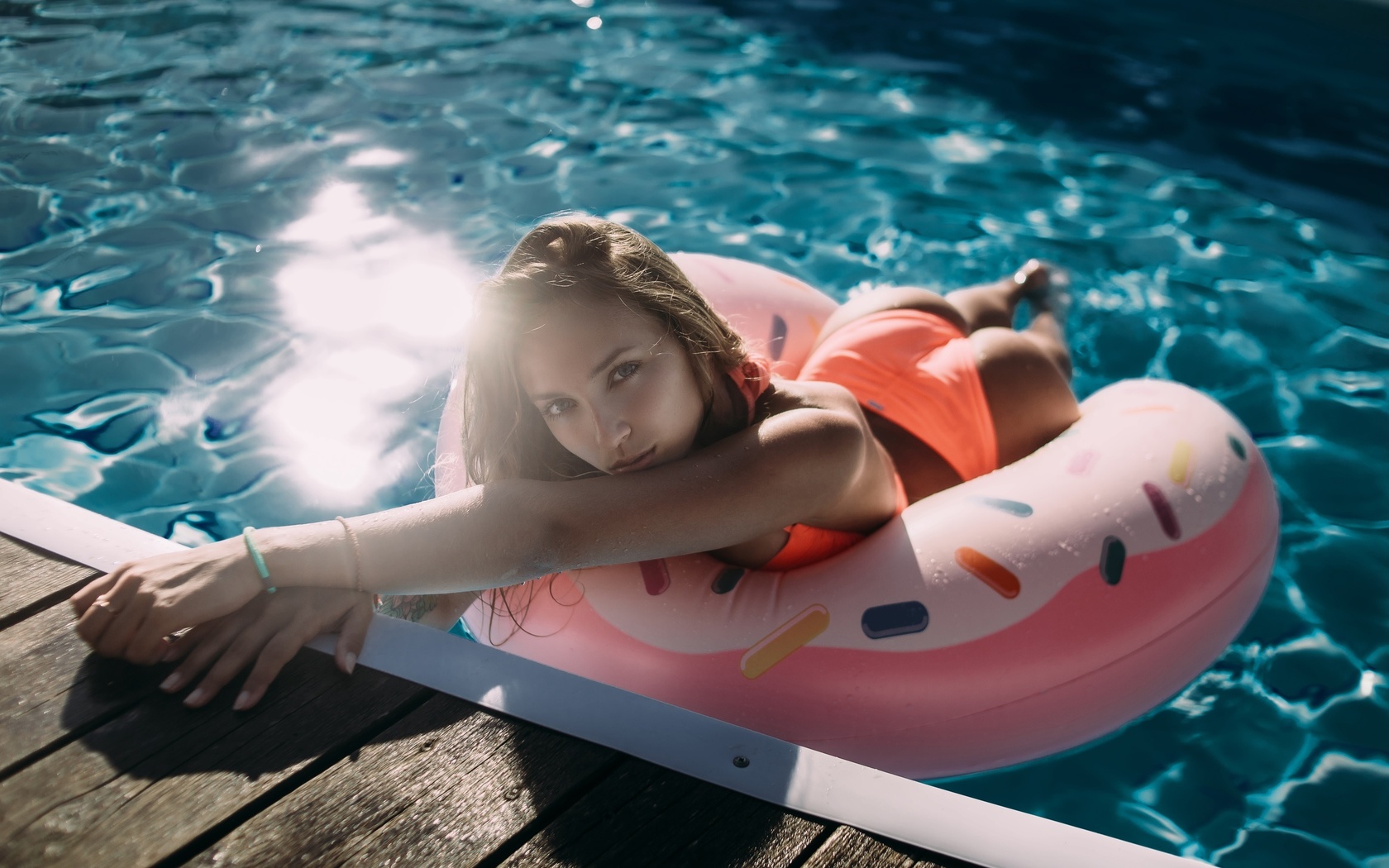 women, swimming pool, inflatable rings, ass, blonde, tanned, water drops, orange bikini, portrait, tattoo