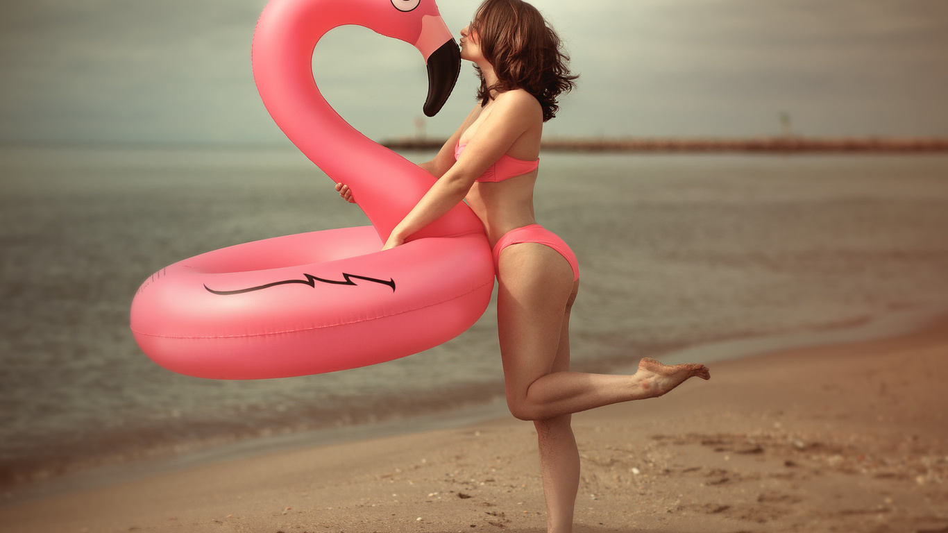 women, inflatable chair, pink bikinis, sand, sea, ass, women outdoors, laurent kace, brunette, sunglasses