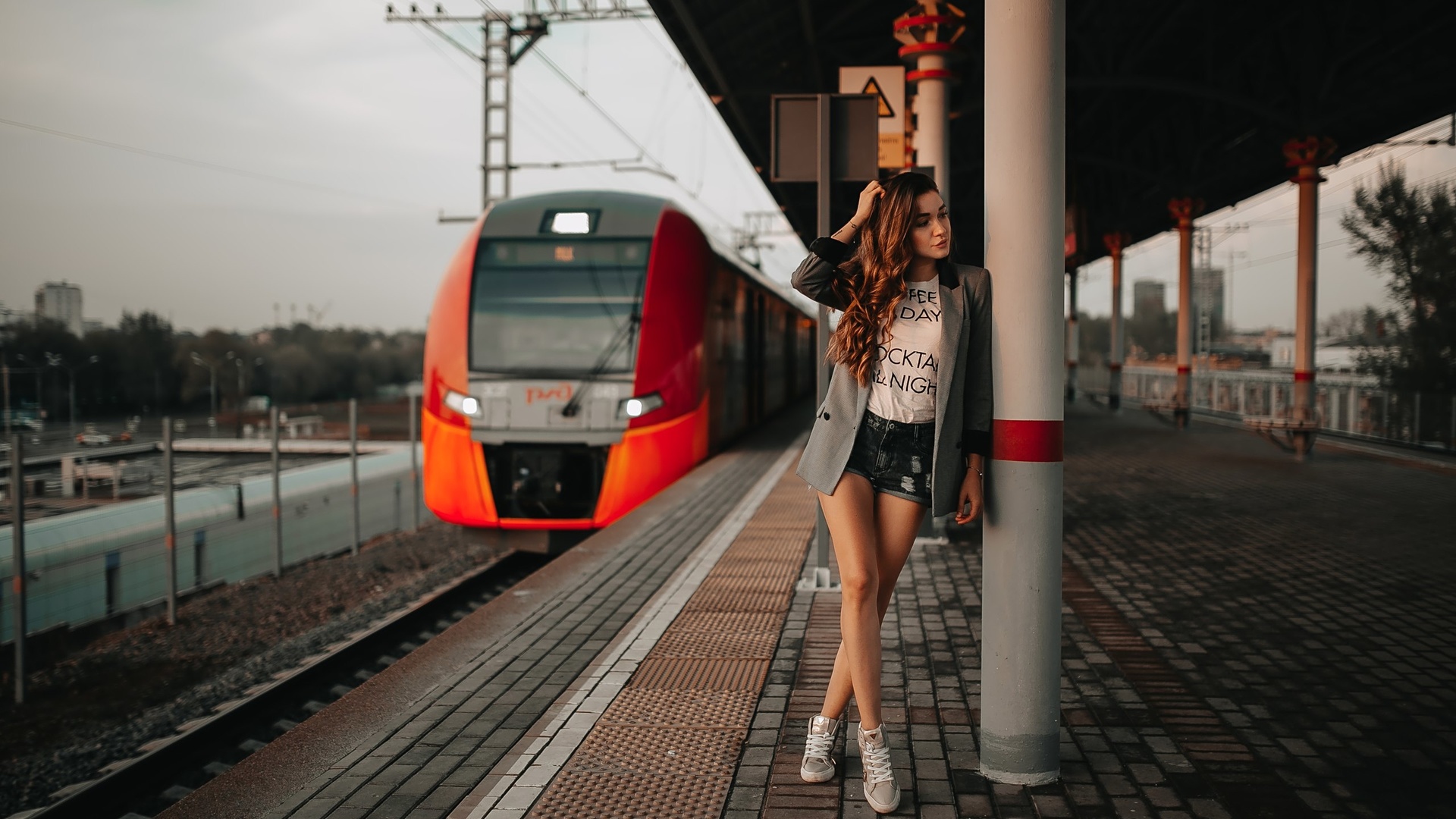 women, tanned, train station, portrait, jean shorts, train, sneakers