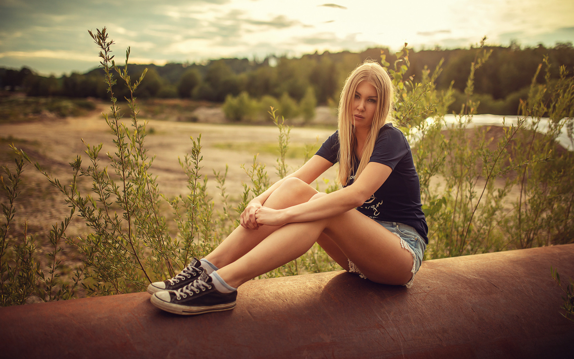 women, blonde, sitting, socks, jean shorts, t-shirt, sneakers, women outdoors, portrait