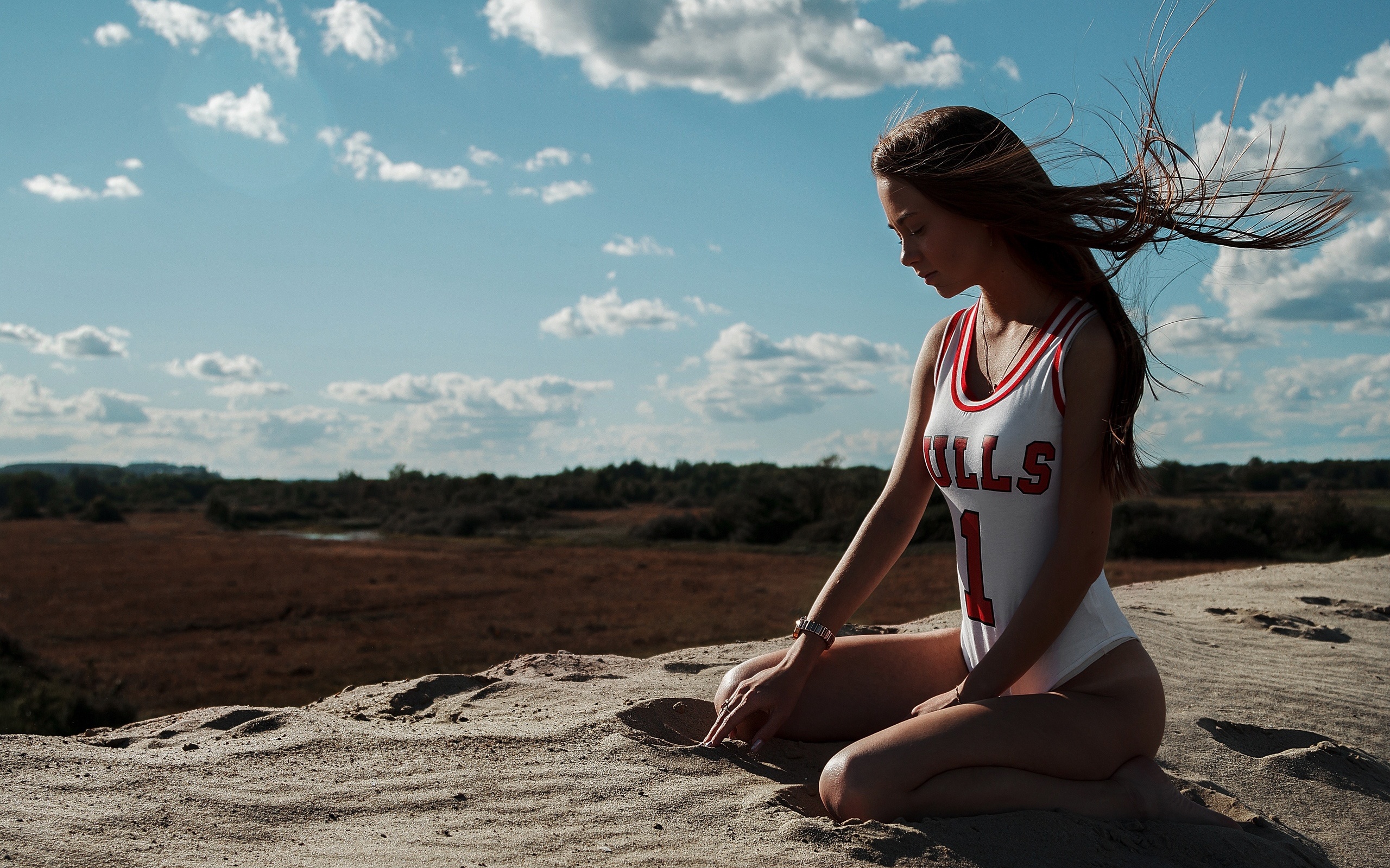 women, one-piece swimsuit, kneeling, tanned, tan lines, sand, long hair, women outdoors