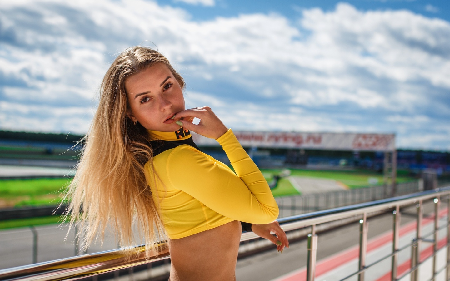 women, blonde, race tracks, finger on lips, portrait, pierced navel, women outdoors