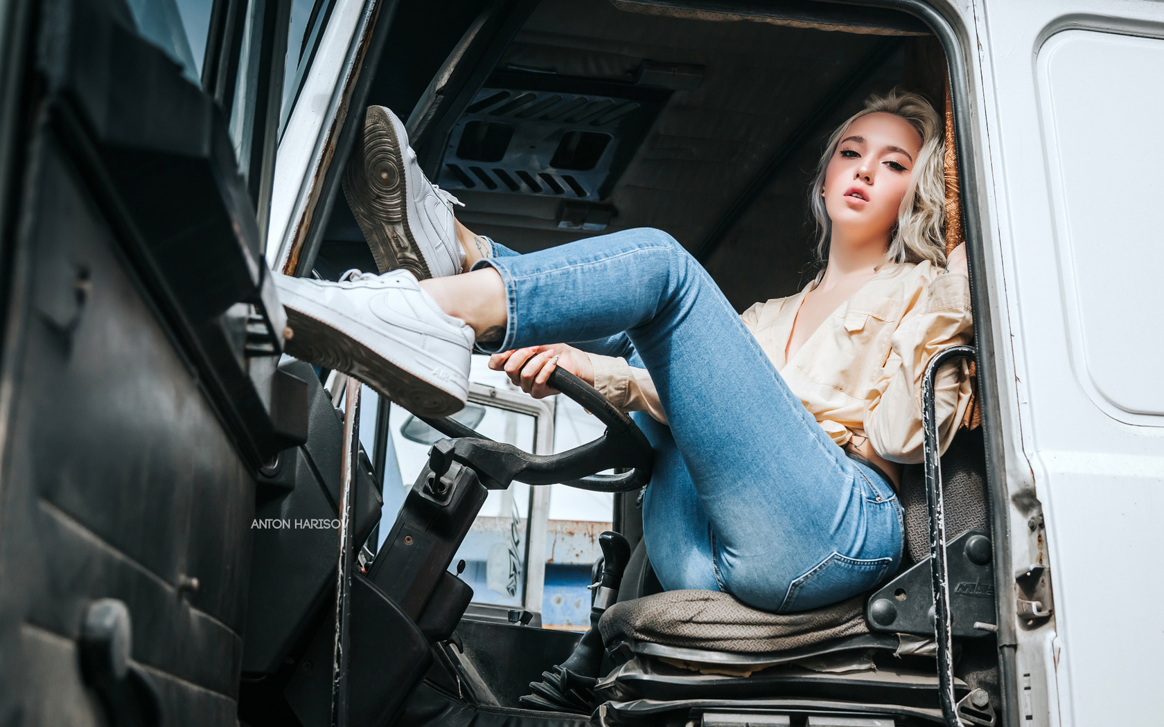 women, blonde, dyed hair, anton harisov, trucks, jeans, sitting, sneakers, tattoo, nike