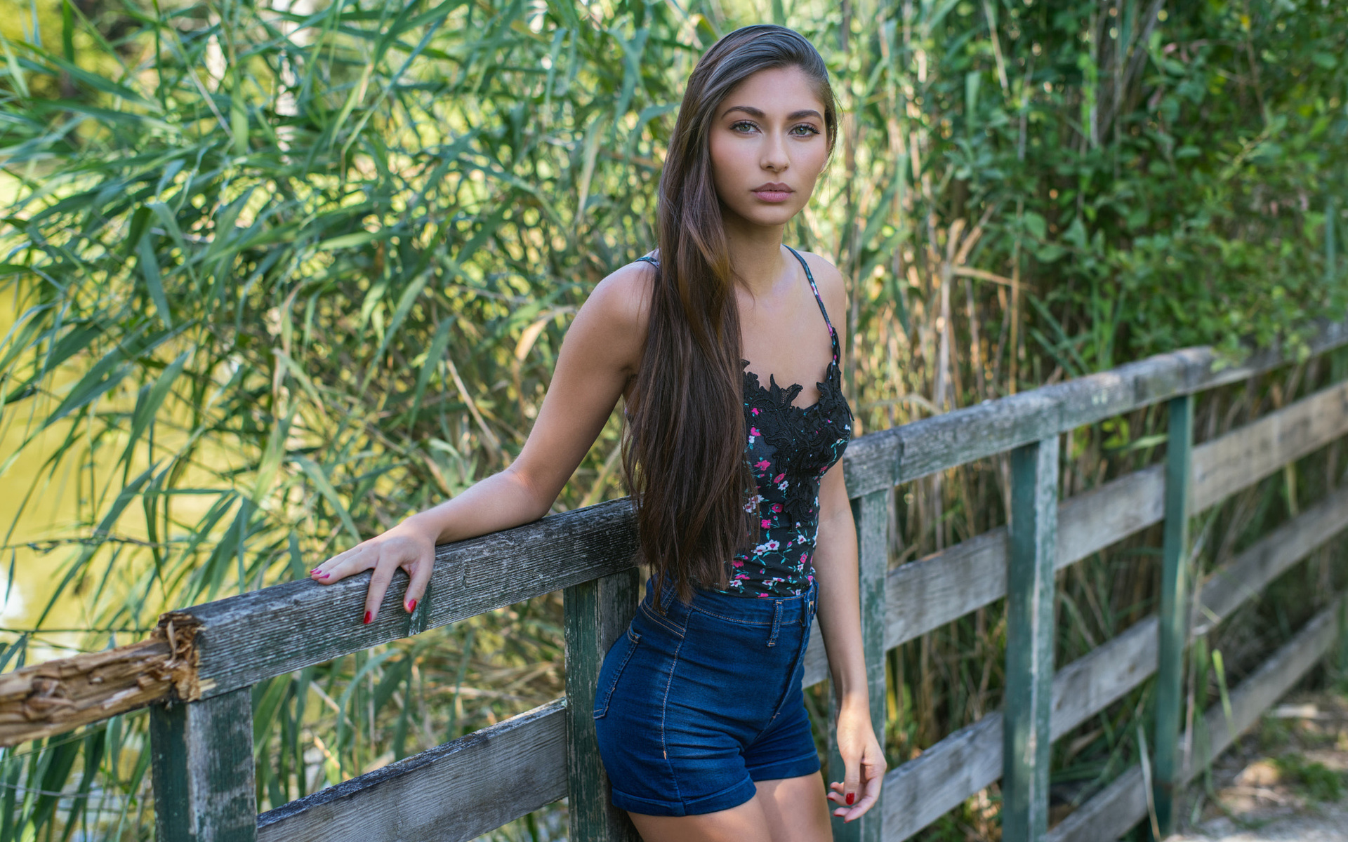 women, portrait, fence, long hair, jean shorts, red nails