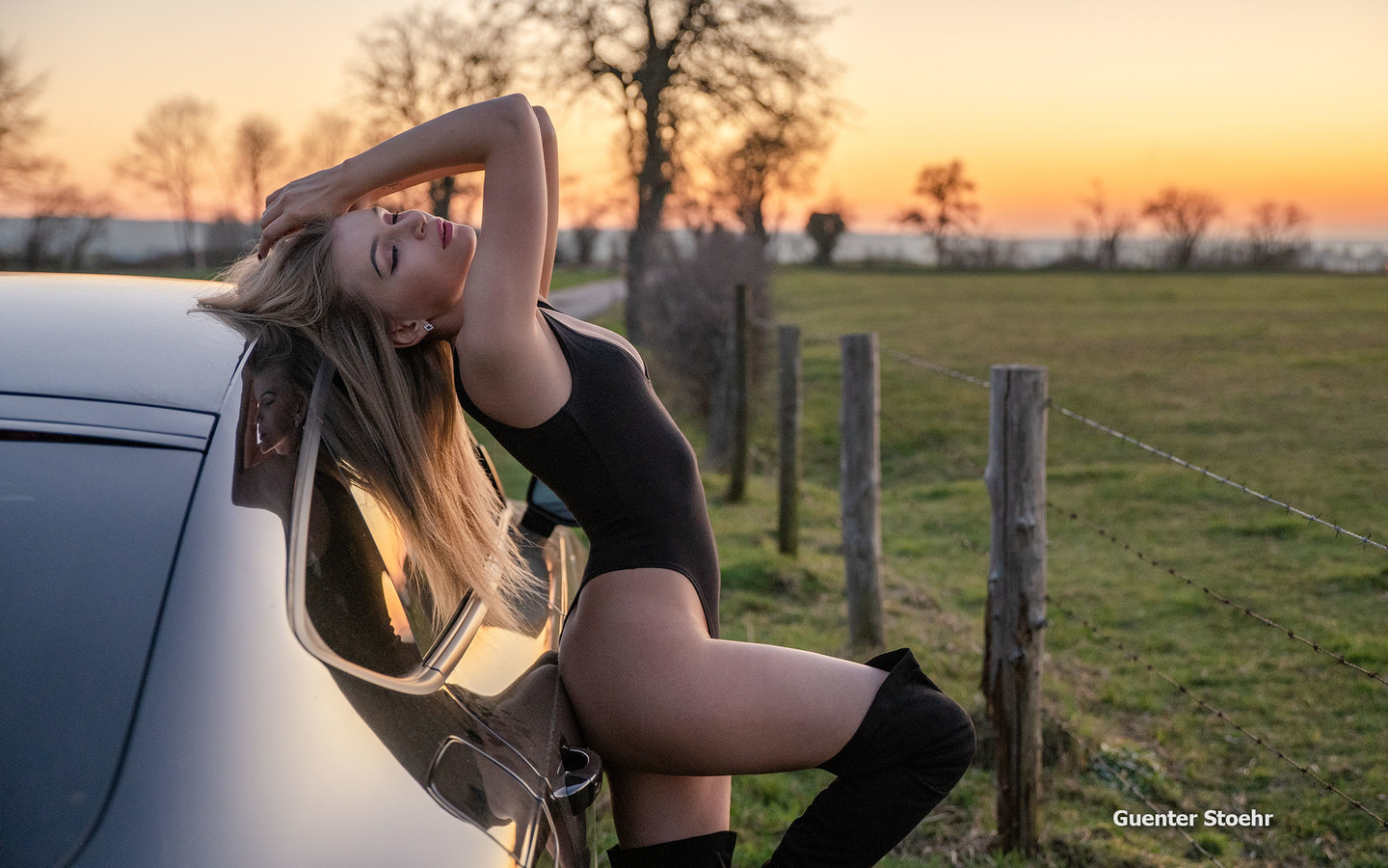 women, guenter stoehr, blonde, ass, fence, women with cars, closed eyes, leotard, knee-high boots, women outdoors