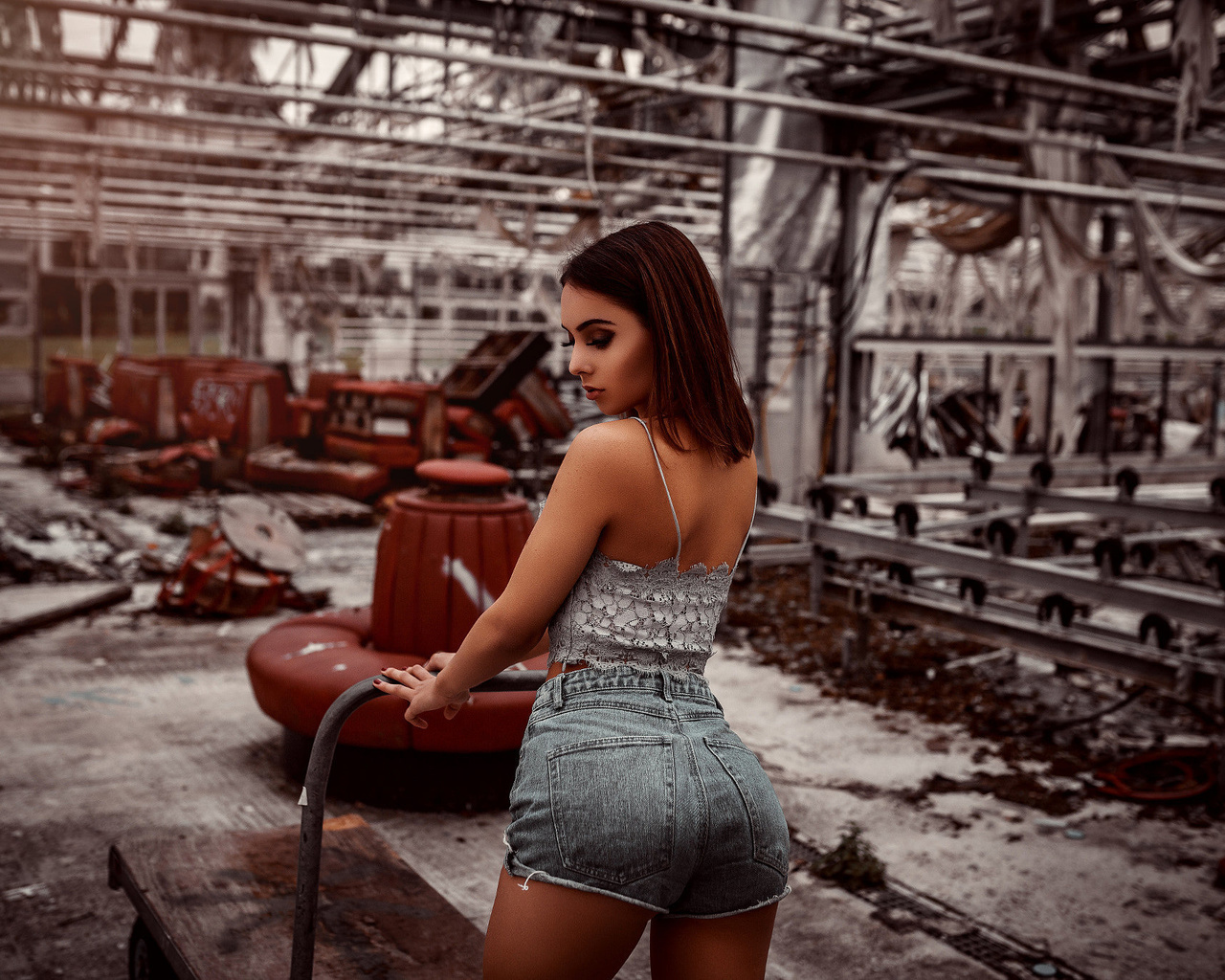 women, jean shorts, brunette, abandoned, red nails, back