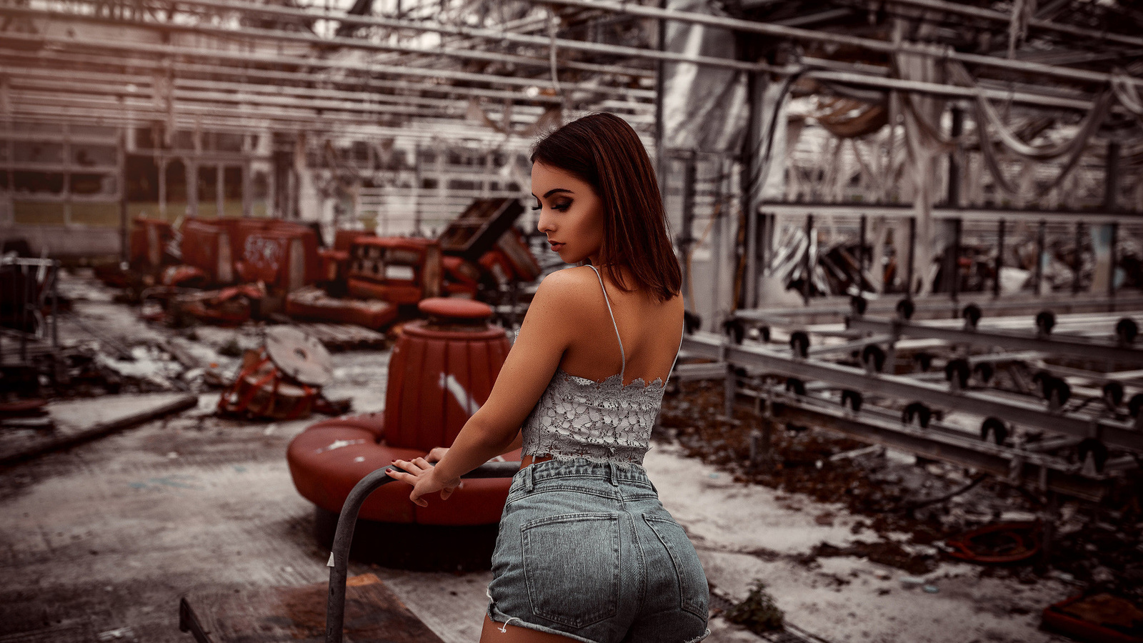 women, jean shorts, brunette, abandoned, red nails, back