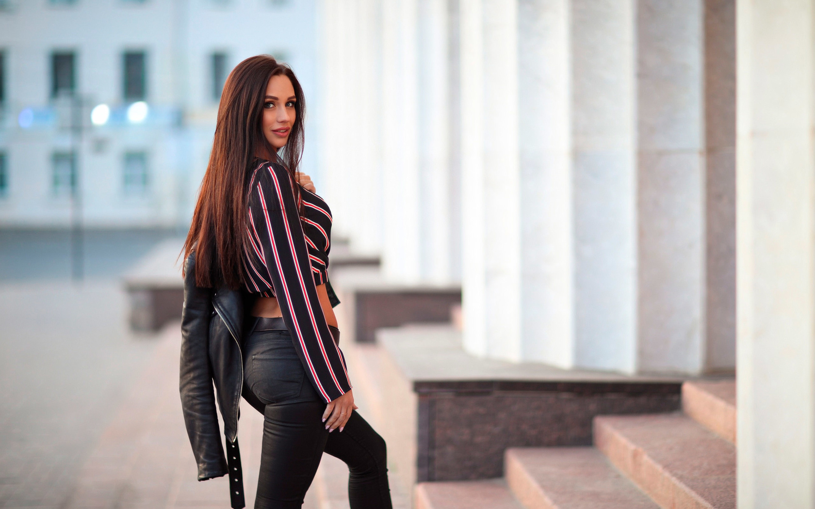 women, leather jackets, jeans, women outdoors, belt, long hair, pink lipstick, stairs, smiling