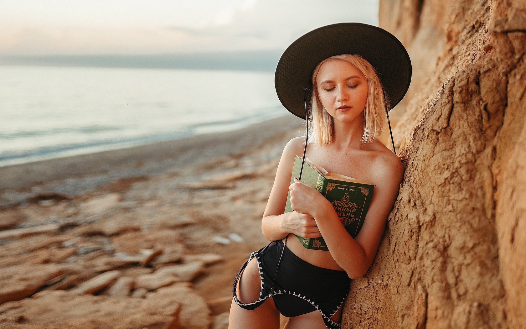 women, hat, one-piece swimsuit, sunset, sea, brunette, black swimsuit, books, closed eyes, red nails, strategic covering, the gap