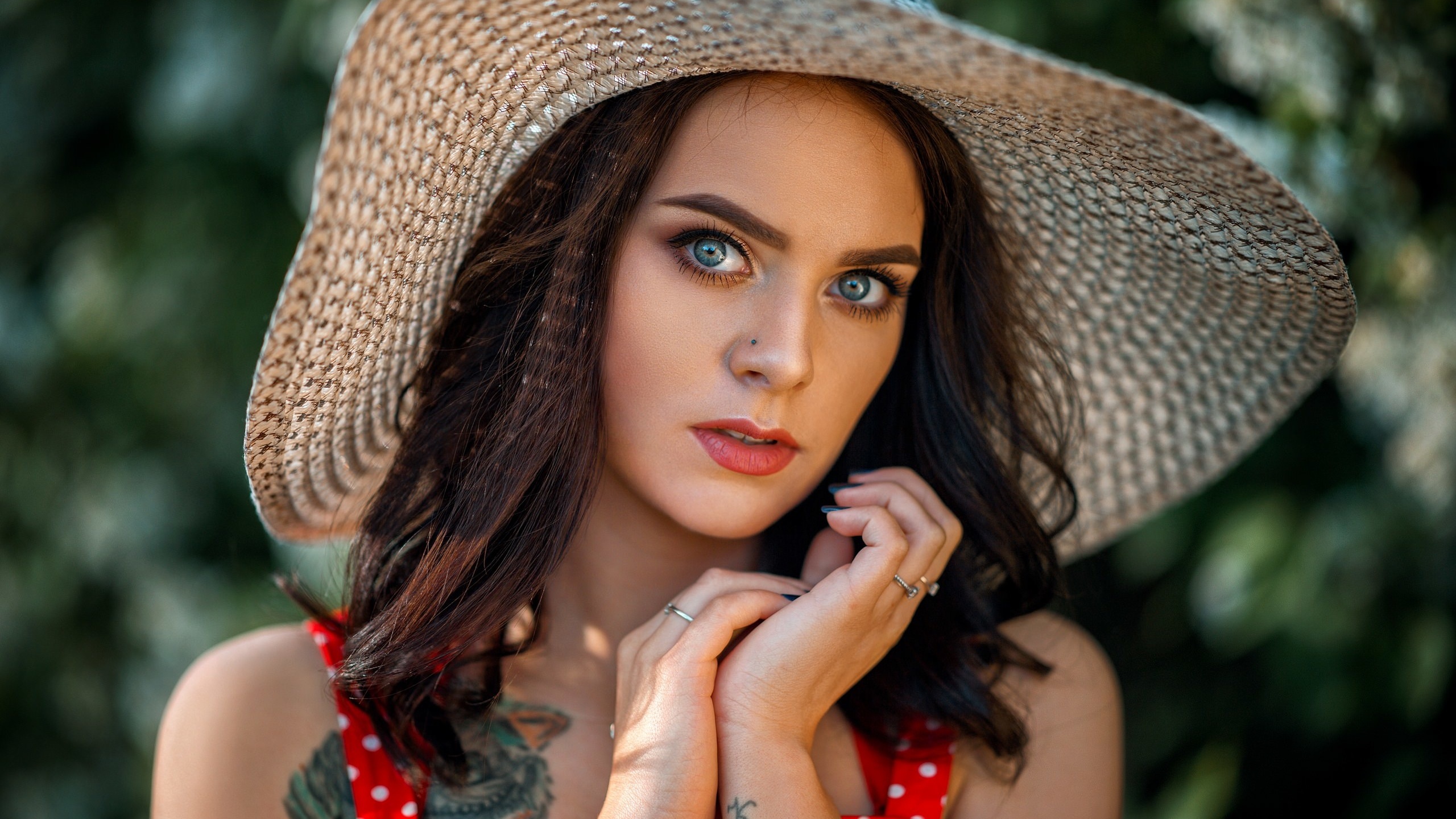 women, red dress, polka dots, women outdoors, tattoo, pierced nose, blue nails, portrait, face, gray eyes, red lipstick, hat