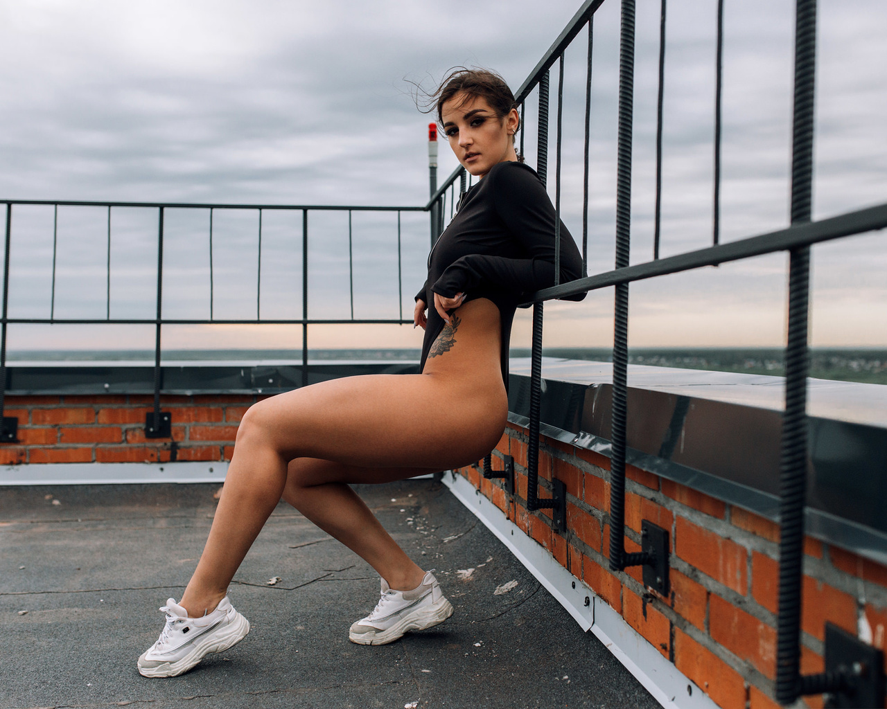 women, ass, tattoo, leotard, sneakers, rooftops, bricks, women outdoors, fence, brunette, squatting, bodysuit