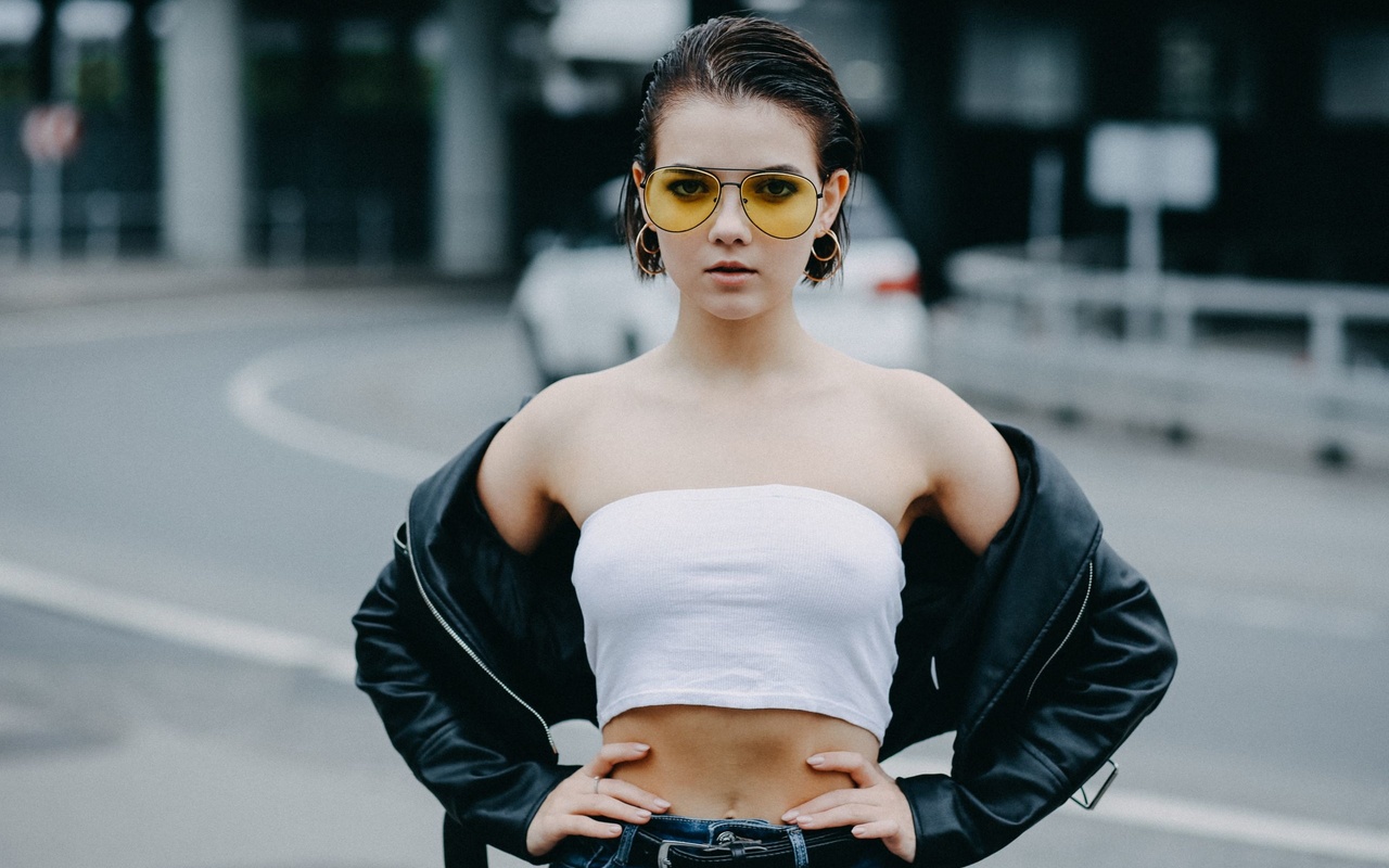 victoria sokolova, women, portrait, women outdoors, women with glasses, leather jackets, tank top, belt, bare shoulders, belly, hands on hips, short hair, jeans,   ,alexander schlesinger