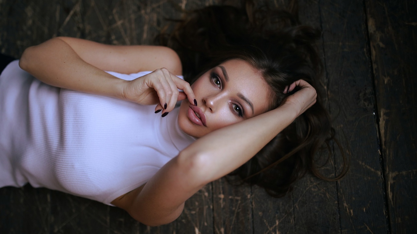 women, top view, on the floor, juicy lips, painted nails, portrait, wooden floor, pink lipstick