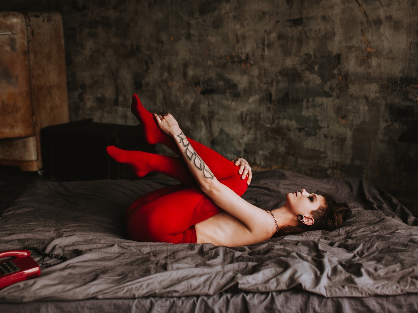 women, phone, ass, tattoo, topless, ribs, fridge, wall, feet in the air, leggings, closed eyes, in bed