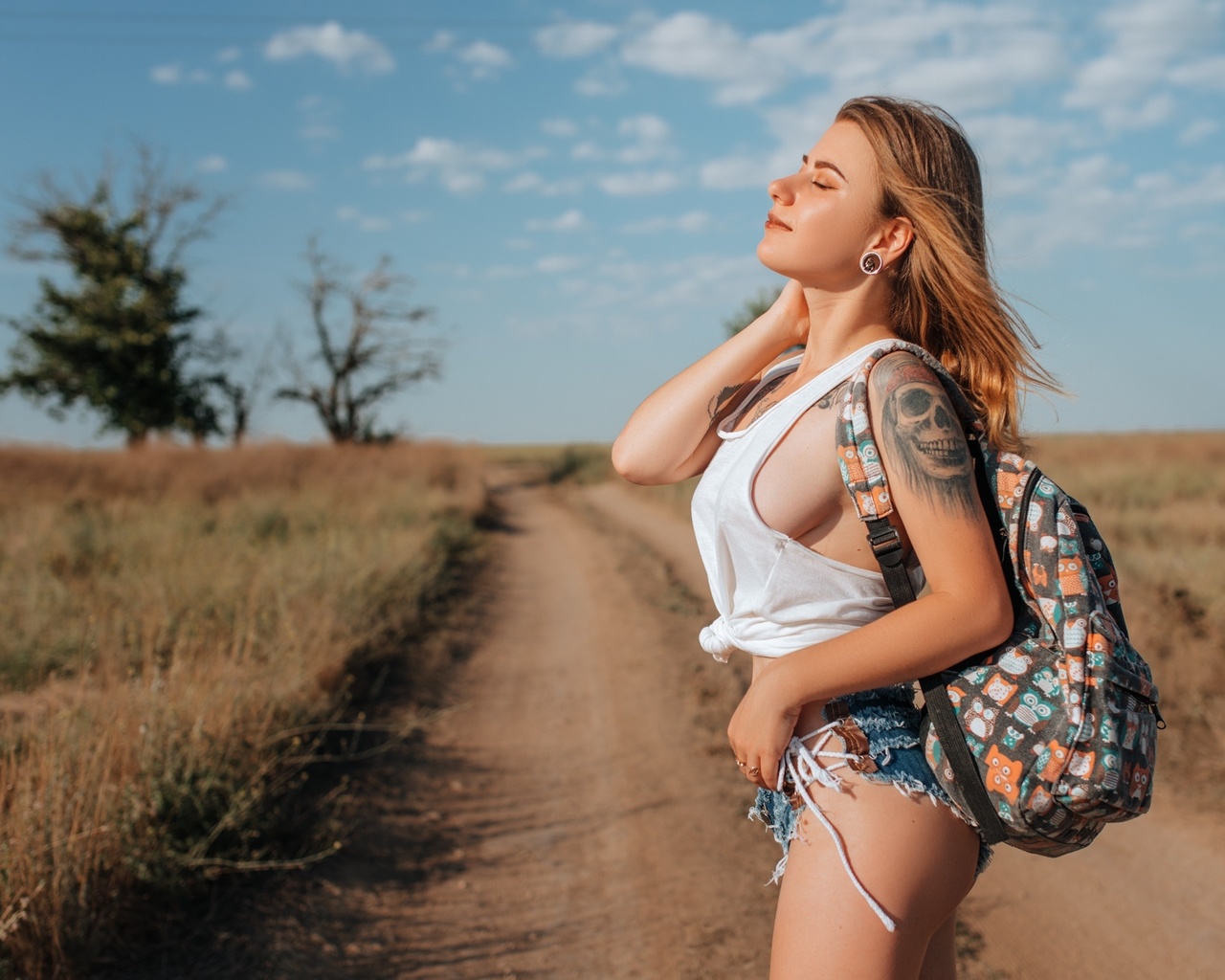 women, handbags, blonde, jean shorts, road, women outdoors, tank top, sky, clouds, closed eyes, tattoo, sideboob, ass, brunette, trees, boobs