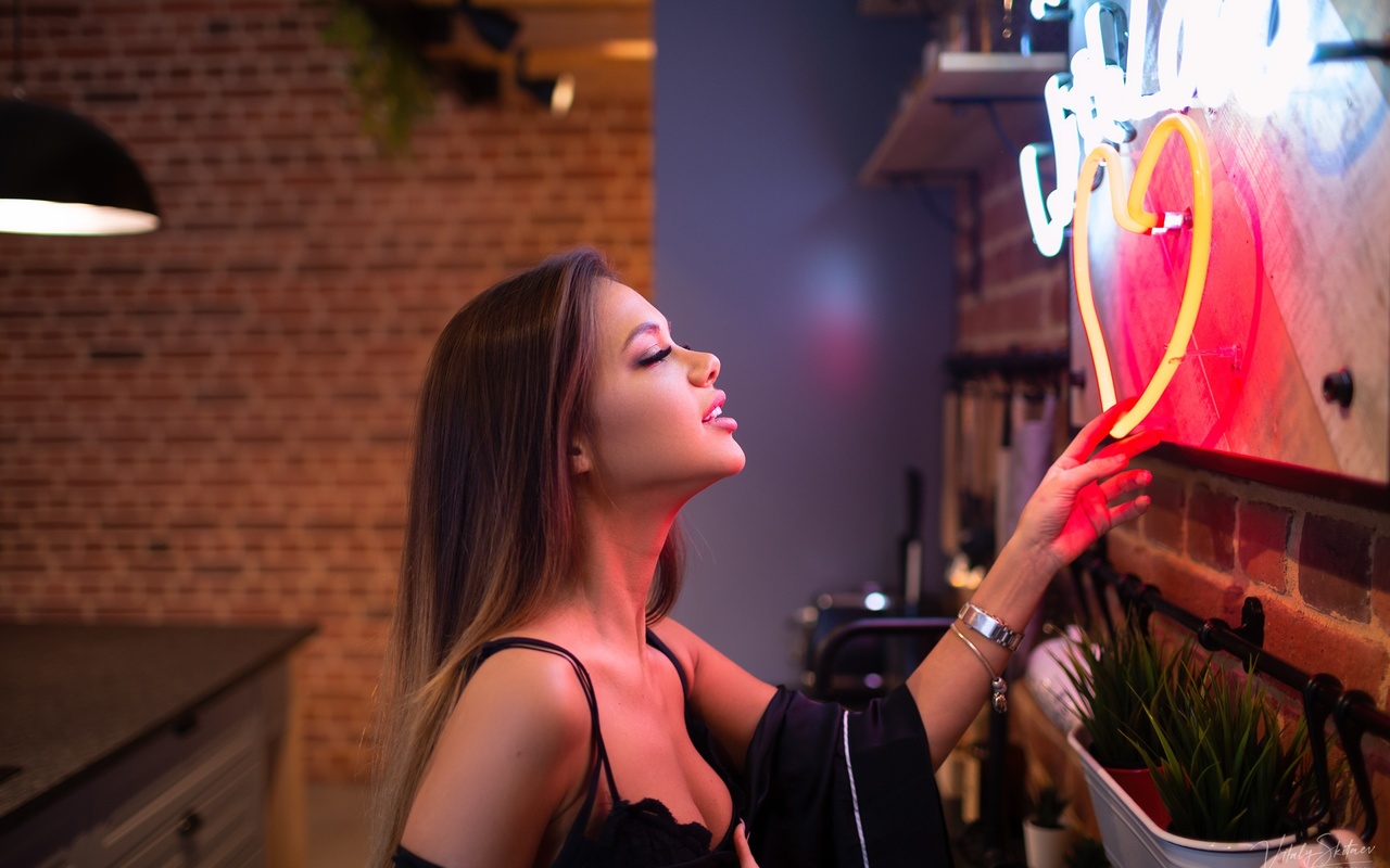 women, vitaly skitaev, kitchen, black lingerie, portrait, black bras, neon, long hair, watch, brunette