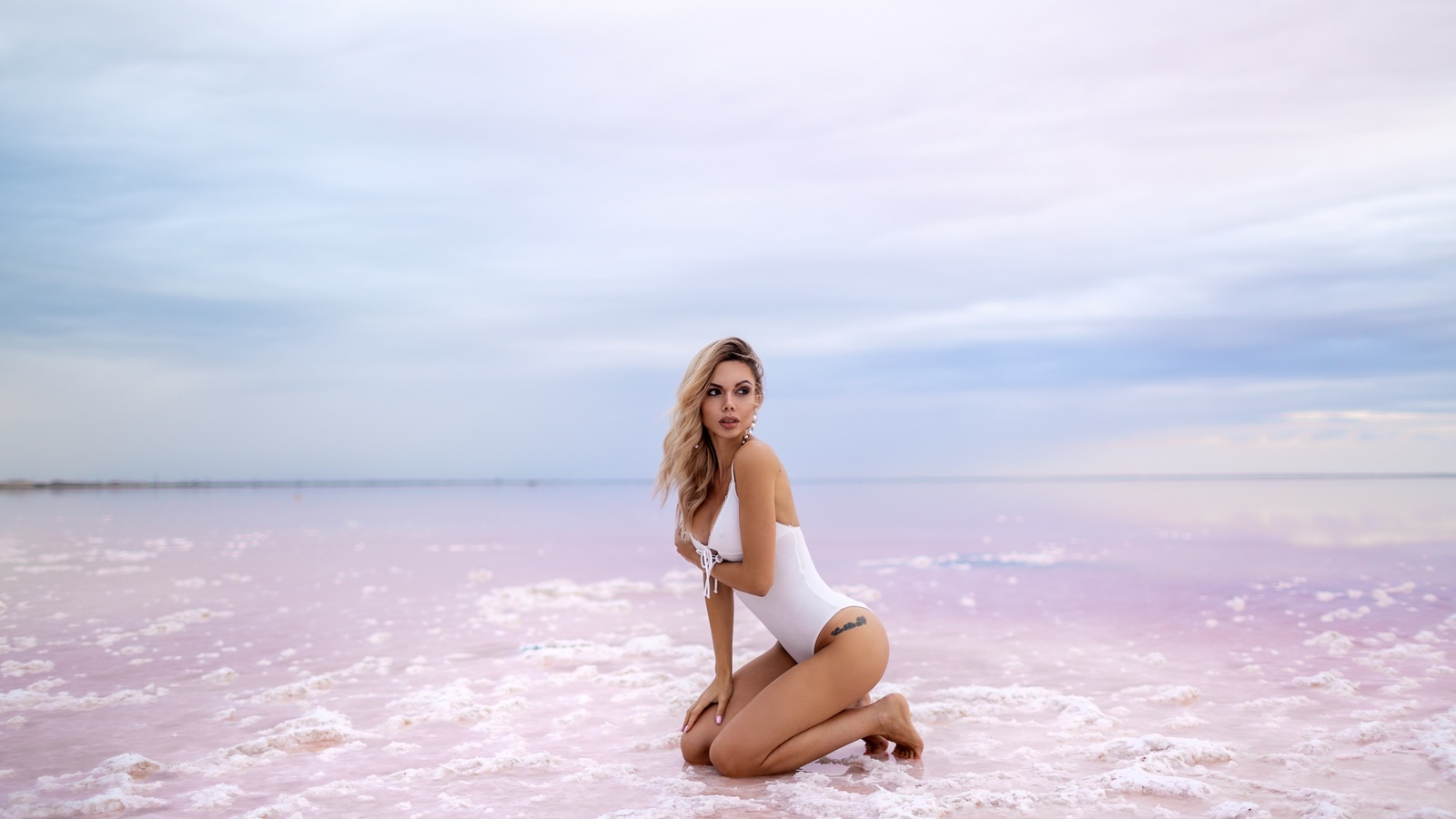 women, vitaly skitaev, blonde, kneeling, ass, water, cleavage, swimwear, one-piece swimsuit, brunette, women outdoors, pink nails, tattoo