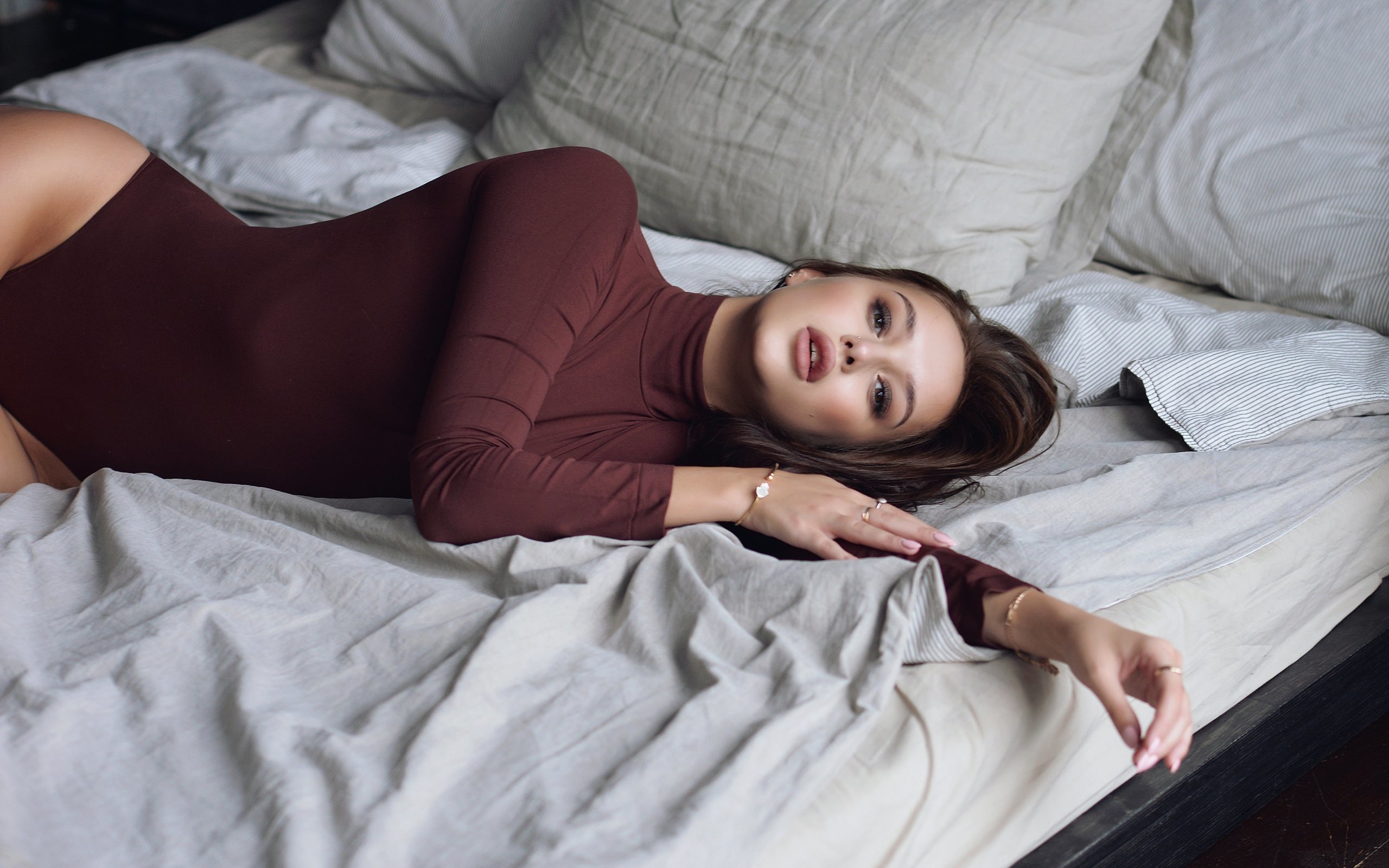 women, brunette, leotard, pillow, pierced nose, in bed, pink nails, ribs, brown eyes, pink lipstick, hips