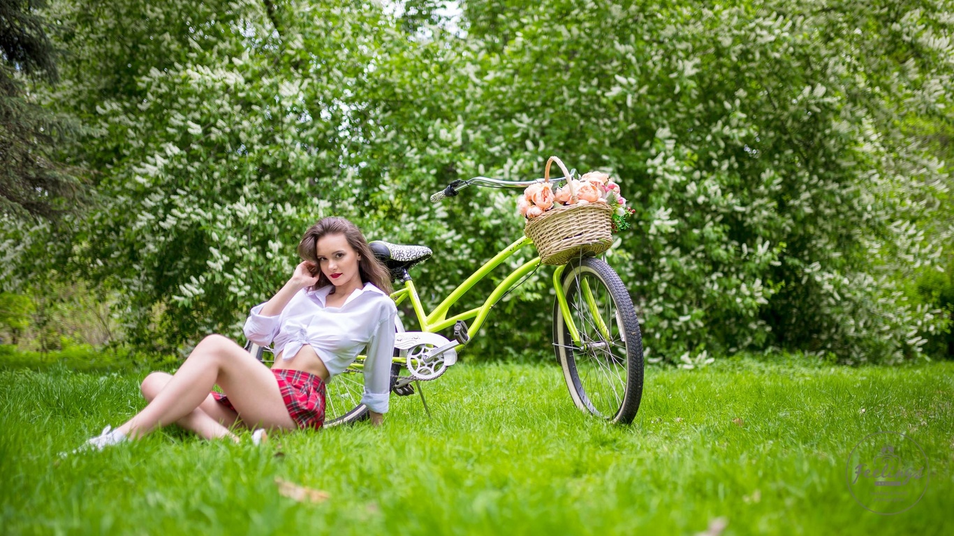 women, plaid skirt, white shirt, schoolgirl uniform, flowers, women outdoors, women with bicycles, bicycle, sitting, grass, red lipstick, sneakers, smiling, skirt, white socks