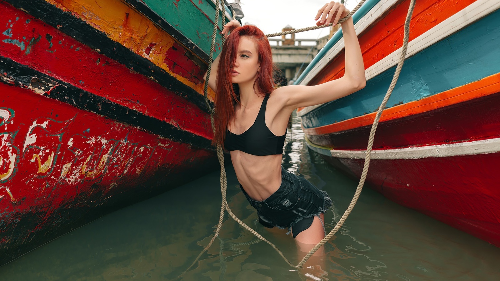 women, redhead, eyeliner, ribs, jean shorts, hair in face, black top, women outdoors, belly, boat, armpits, skinny