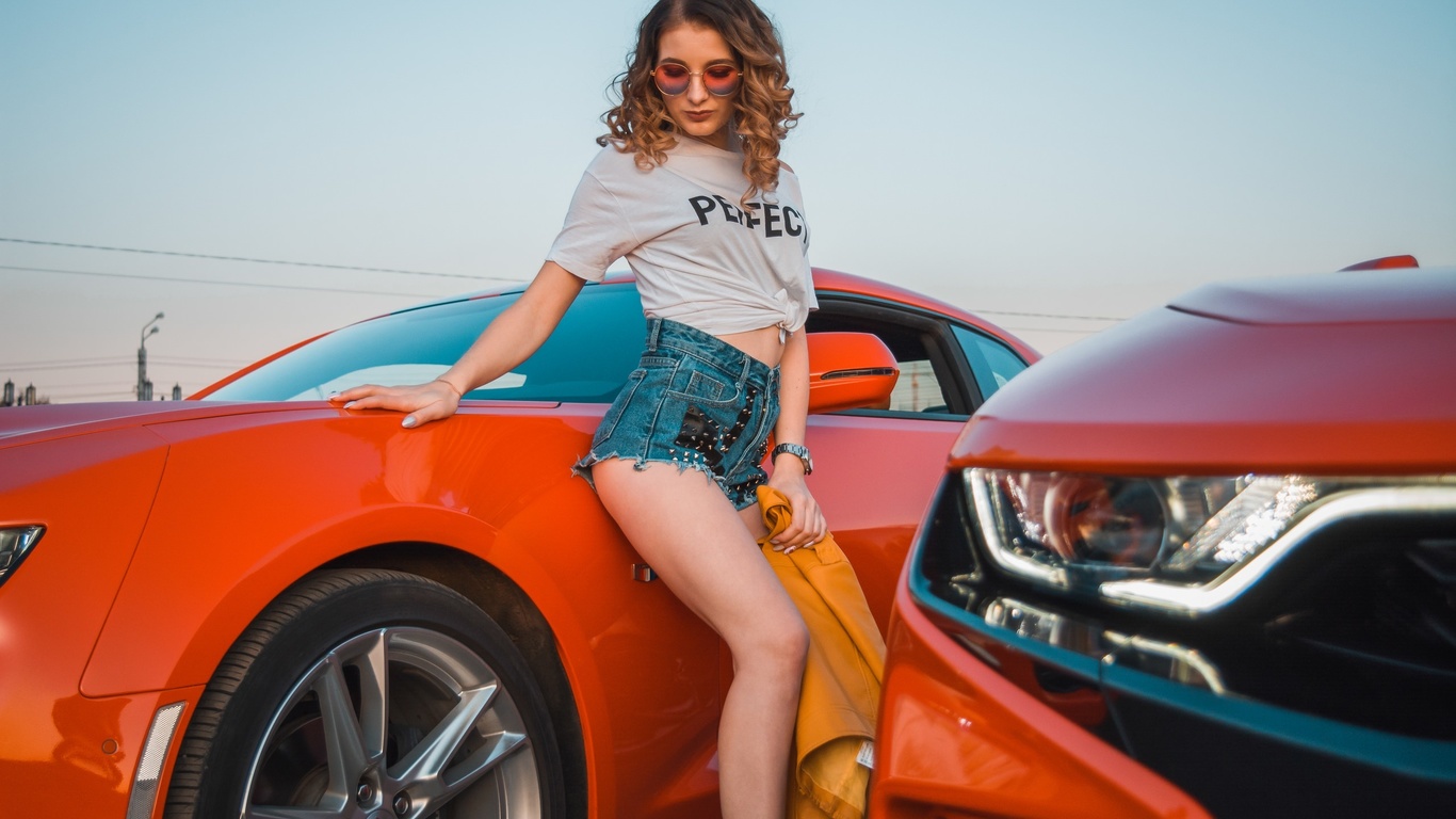 women, women with cars, jean shorts, white t-shirt, watch, women outdoors, curly hair, sky, chevrolet