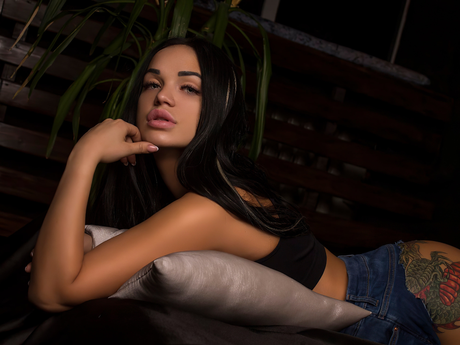 women, ass, plants, pillow, juicy lips, pierced nose, pink lipstick, brunette, women indoors, torn jeans, tattoo