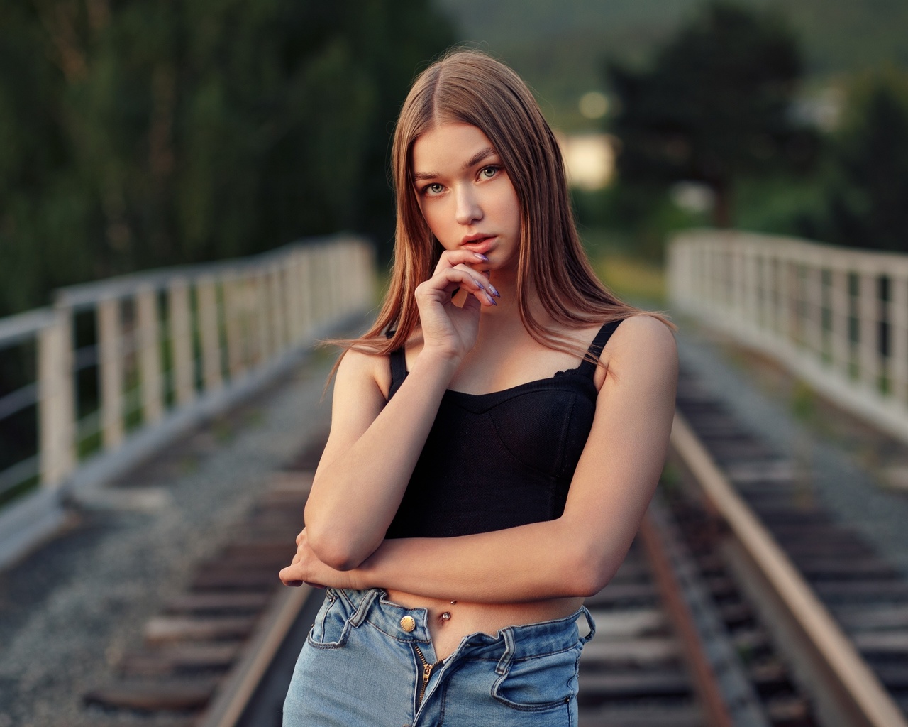 women, pierced navel, finger on lips, railway, women outdoors, zipper, denim, portrait