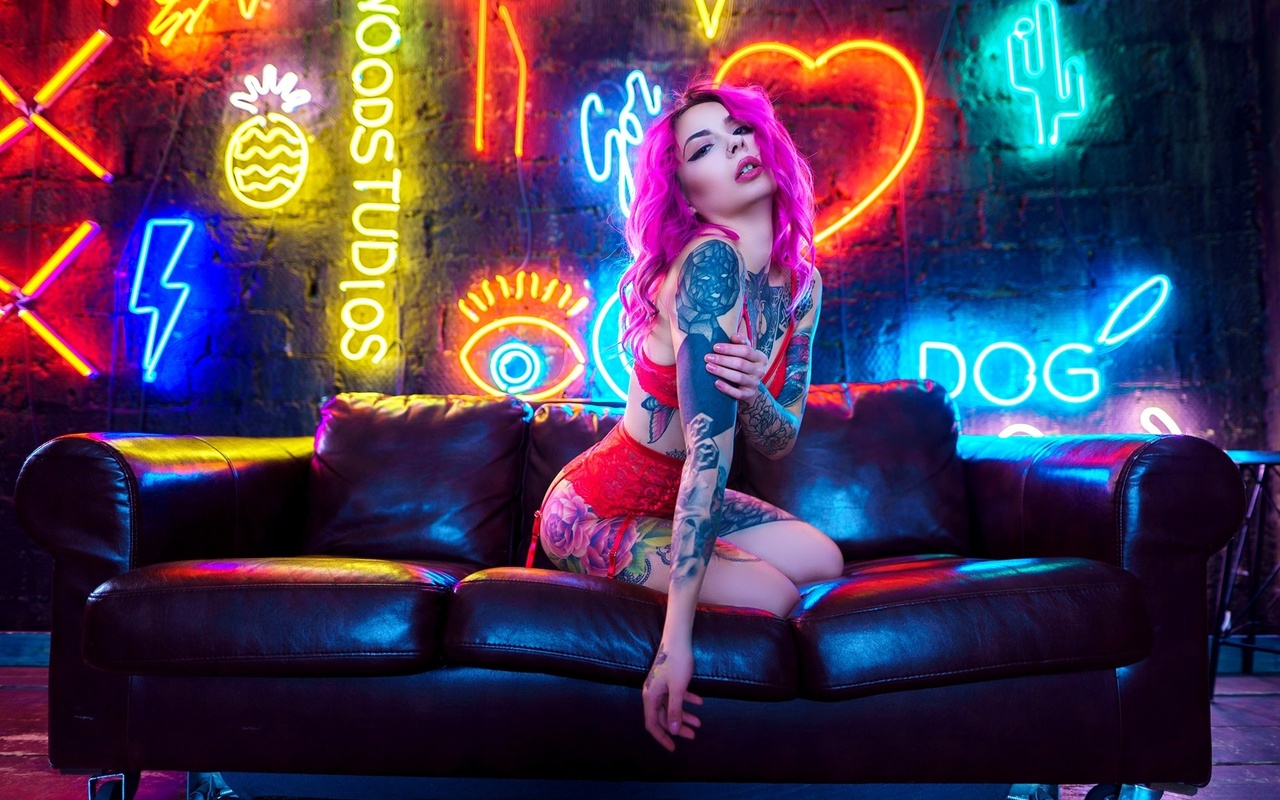 women, dyed hair, red lingerie, neon, women indoors, garter belt, tattoo, nose ring, wall, couch, pink hair, kneeling, ass, eyeliner, wooden floor