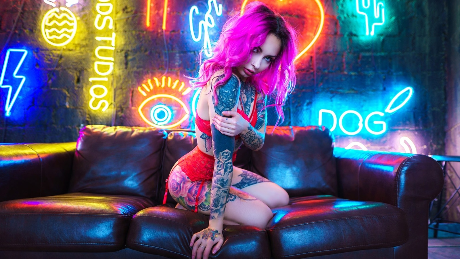 women, dyed hair, red lingerie, neon, women indoors, garter belt, tattoo, nose ring, wall, couch, pink hair, kneeling, ass, wooden floor