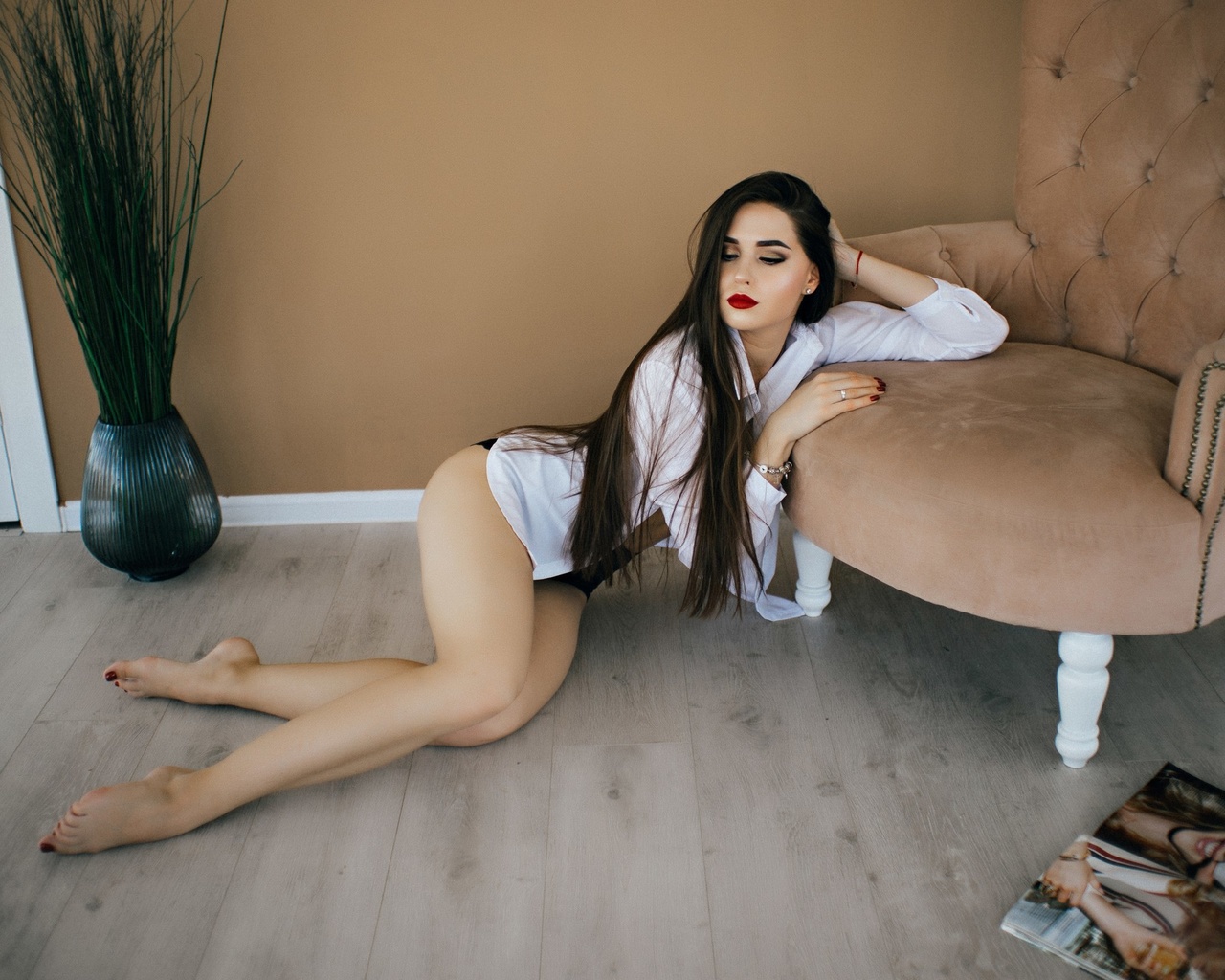 women, on the floor, ass, red lipstick, armchair, magazine, long hair, red nails, white shirt, black panties, door, wall, women indoors