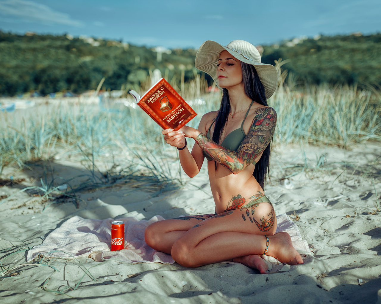 women, hat, bikini, brunette, women outdoors, books, tattoo, sand, sky, coca-cola, belly, sitting, long hair, towel