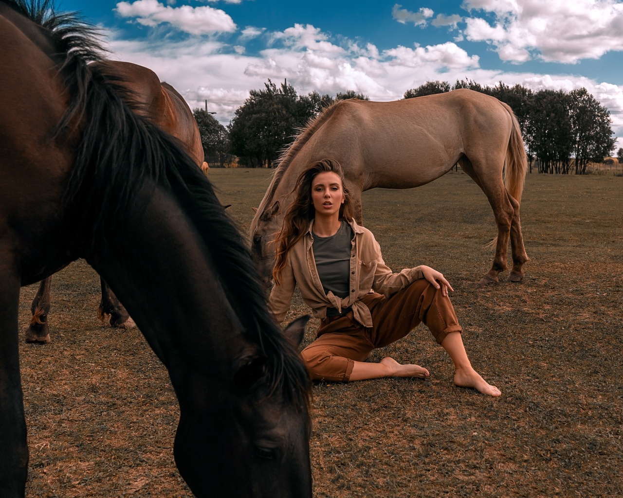 women, sitting, grass, sky, clouds, horse, animals, women outdoors, trees, pants, shirtt-shirt, 