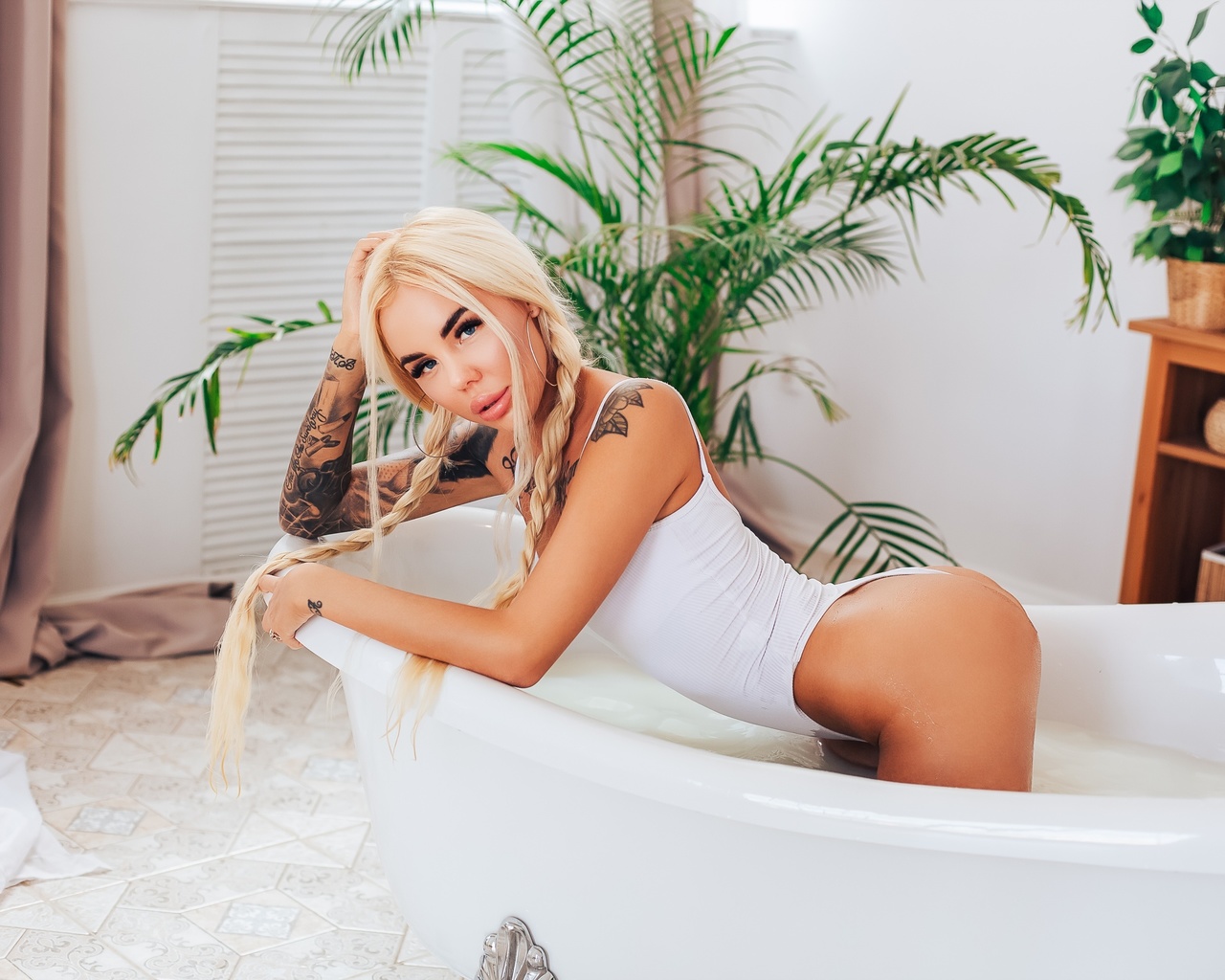 women, blonde, bathtub, kneeling, brunette, plants, tattoo, women indoors, ass, pigtails, hoop earrings, blue eyes, bodysuit, wet body, long hair