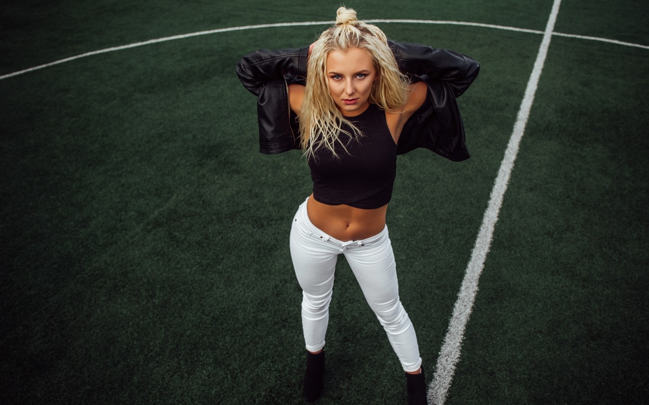 women, soccer field, synthetic grass, jeans, belly, blonde, black jackets, leather jackets, armpits