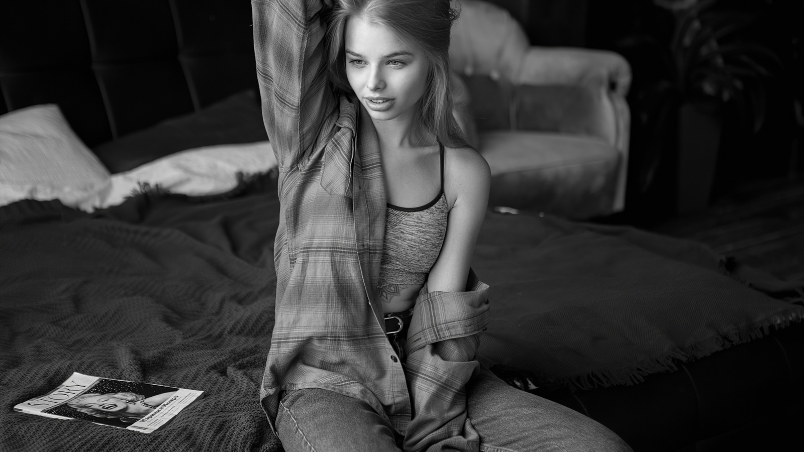 alex nemalevich, blonde, tattoo, women, model, bed, sitting, plaid shirt, monochrome, t-shirt, couch, women indoors, short tops, jeans, magazine