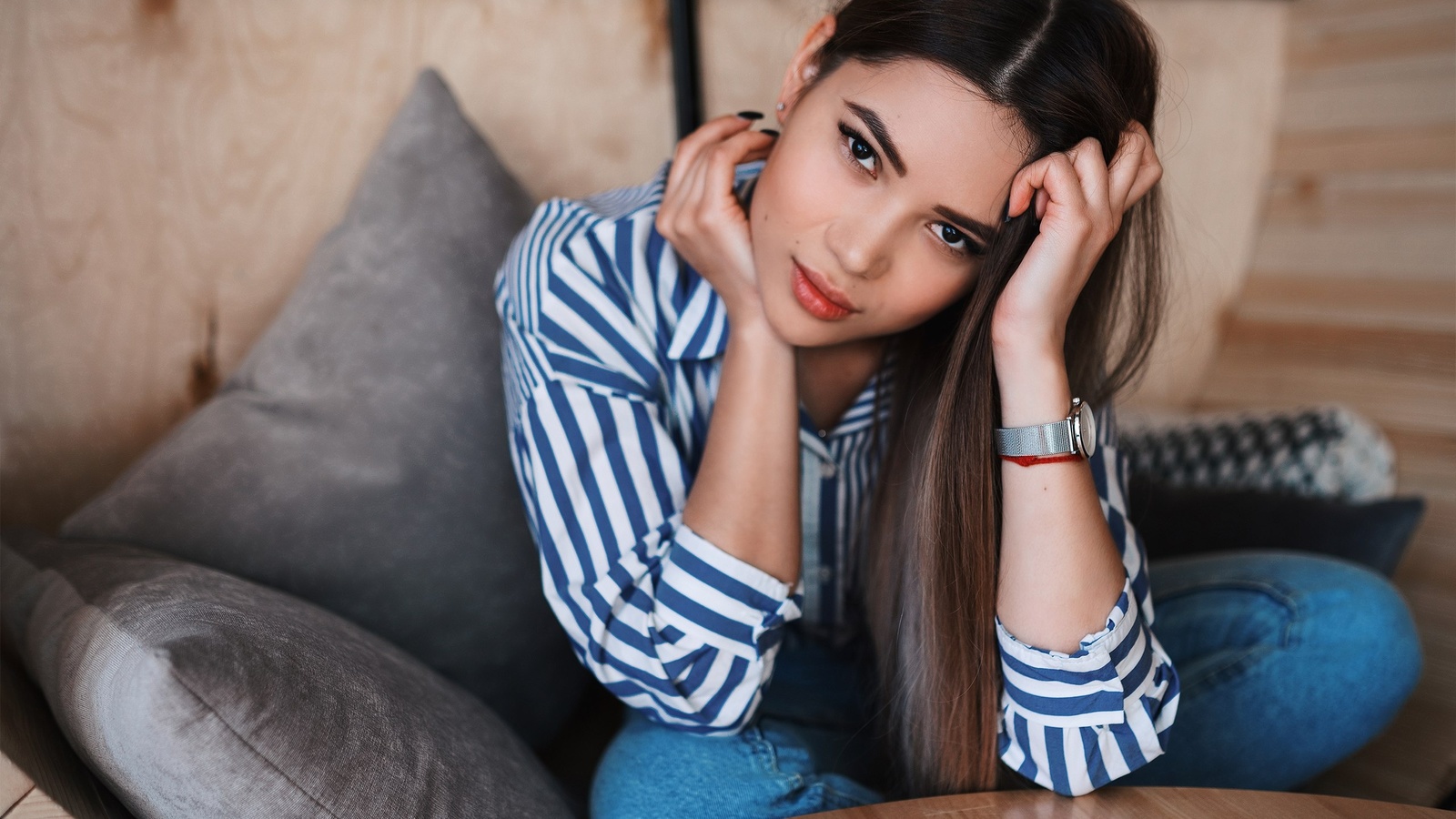 women, model, brunette, women indoors, asian, jeans, striped shirt, couch, table, watch, sitting