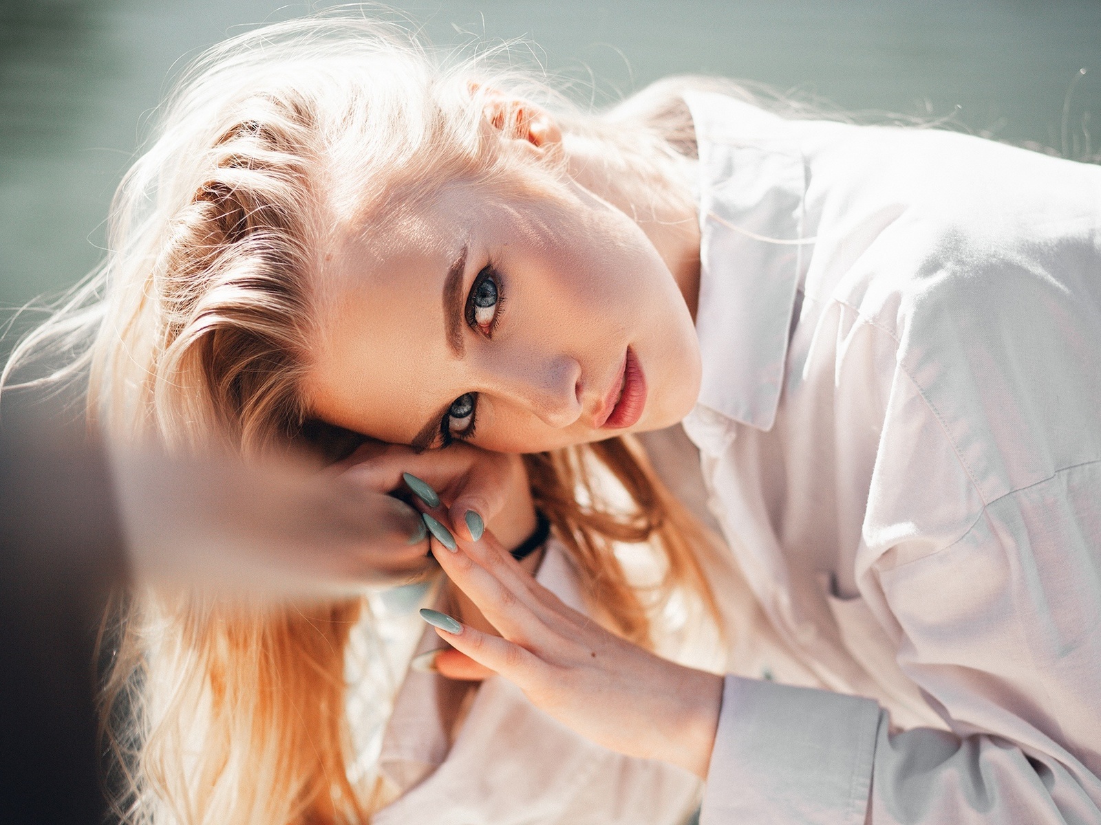 women, model, blonde, women outdoors, face, white shirt, shirt, painted nails, blue nails, looking at viewer